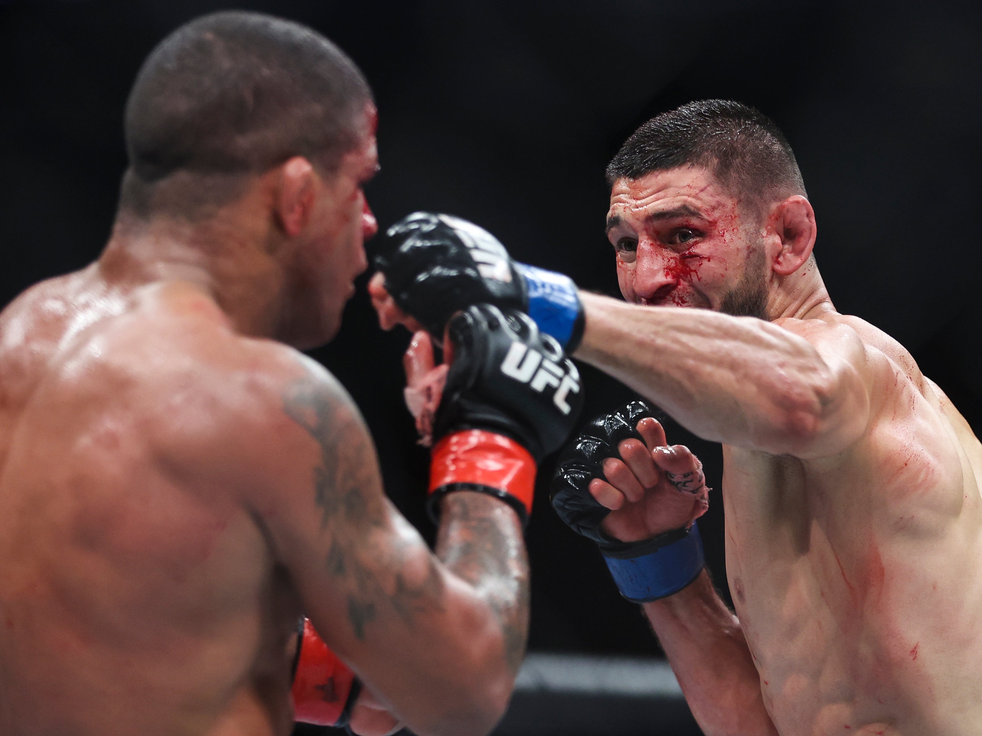 Khamzat Chimaev (right) beat No 2 welterweight Gilbert Burns at UFC 273