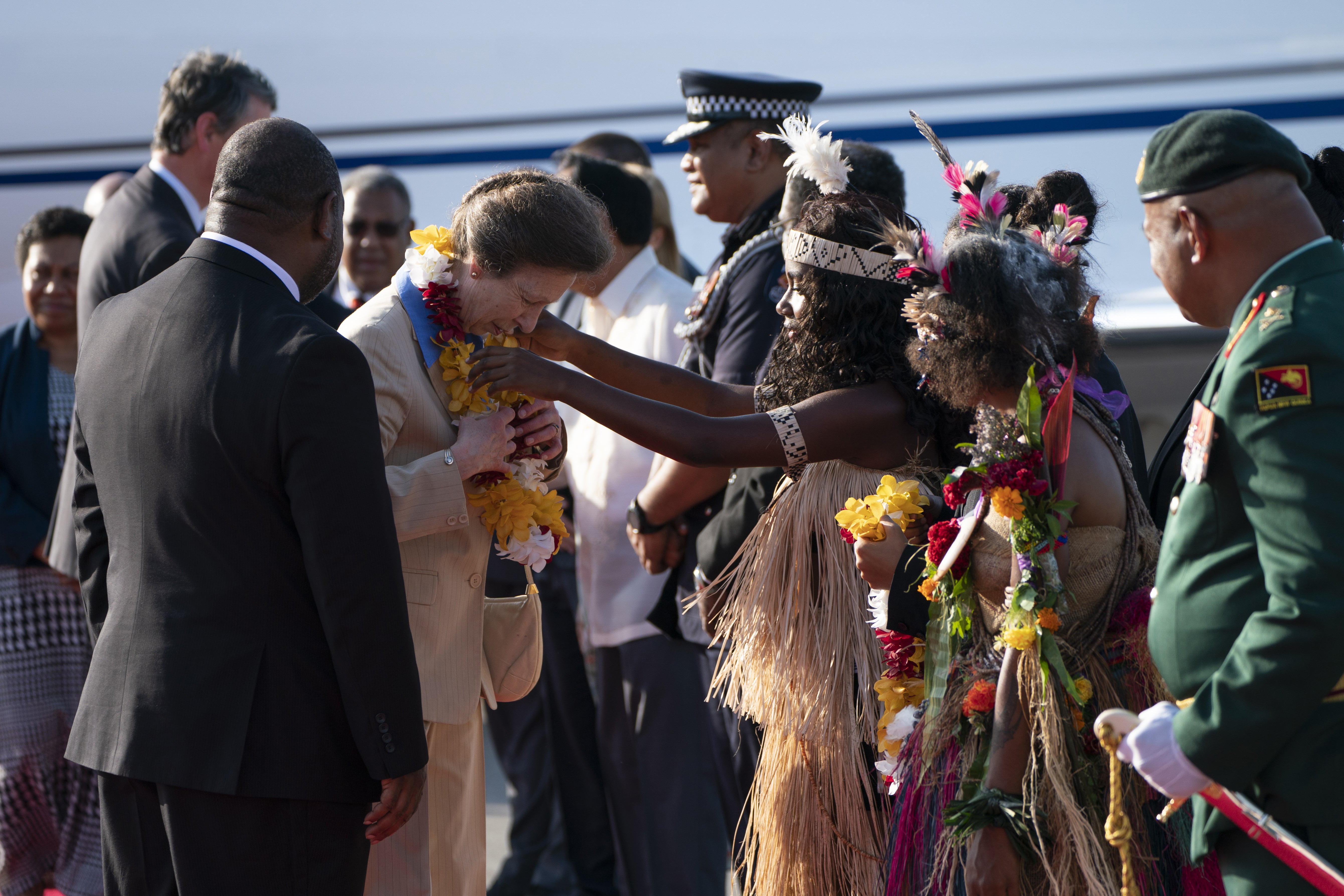 The Princess Royal is presented with a garland of flowers at Jacksons International Airport (Kirsty O’Connor/PA)