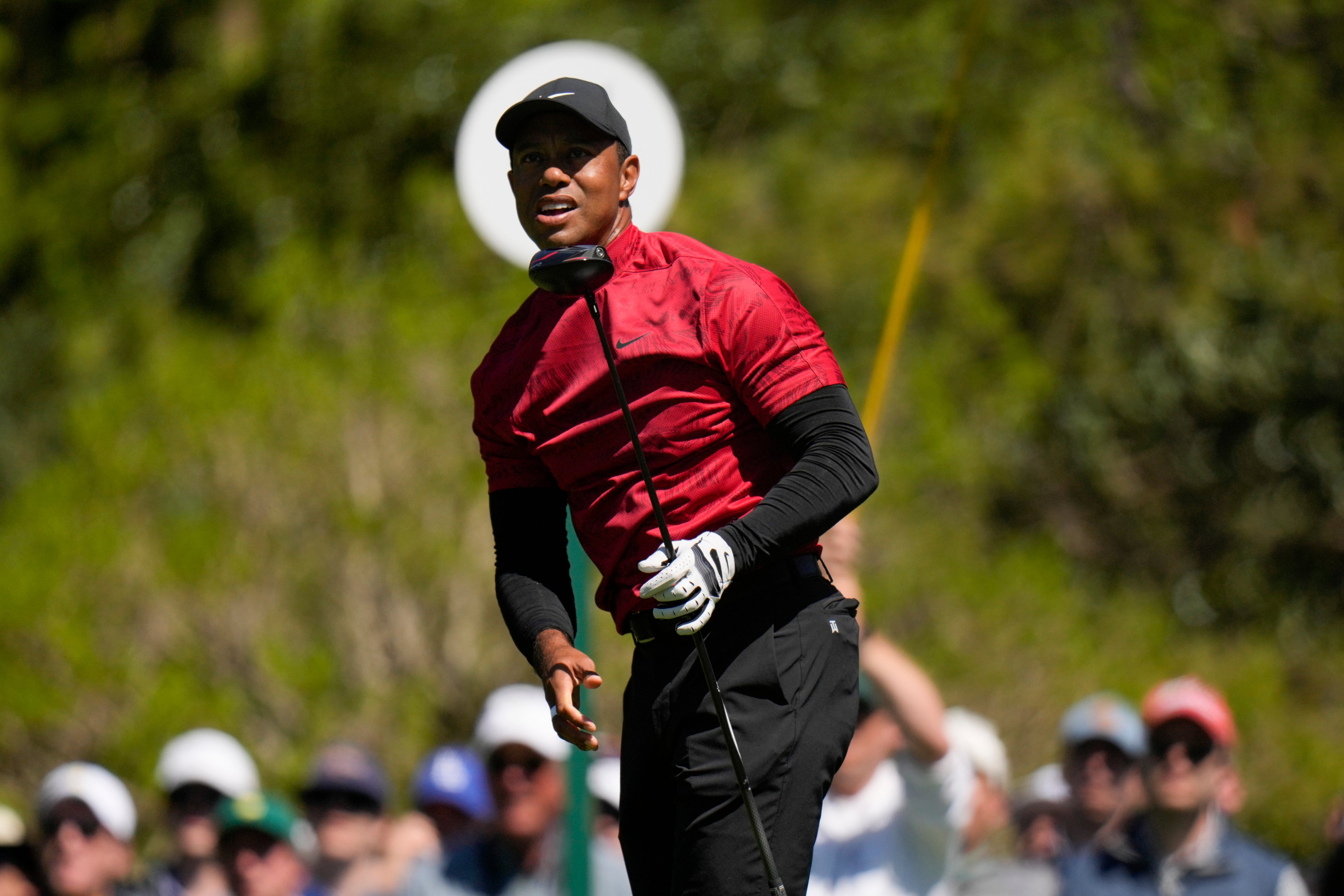 Tiger Woods watches his tee shot on the fifth hole during the final round of the Masters (Jae C. Hong/AP)