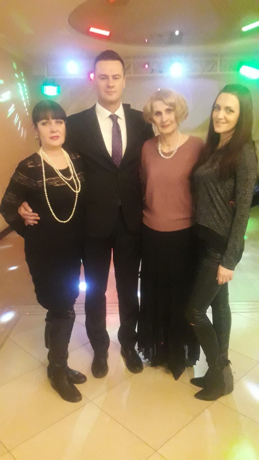 Maksym, his mother, and his sister Natalya, 56, on his mother's 77th birthday