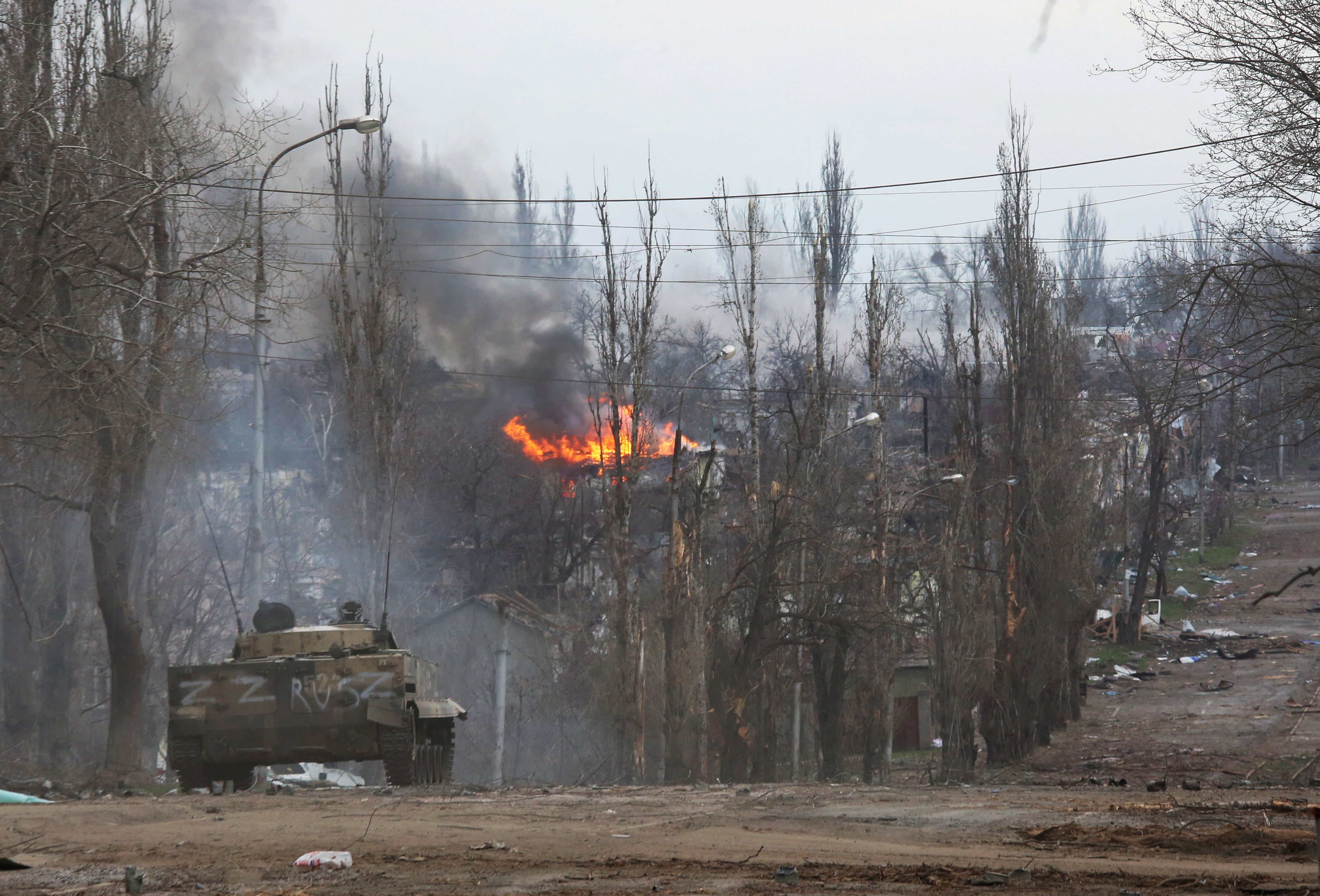 An armoured vehicle of pro-Russian troops is seen in the street during Ukraine-Russia conflict in the southern port city of Mariupol, Ukraine