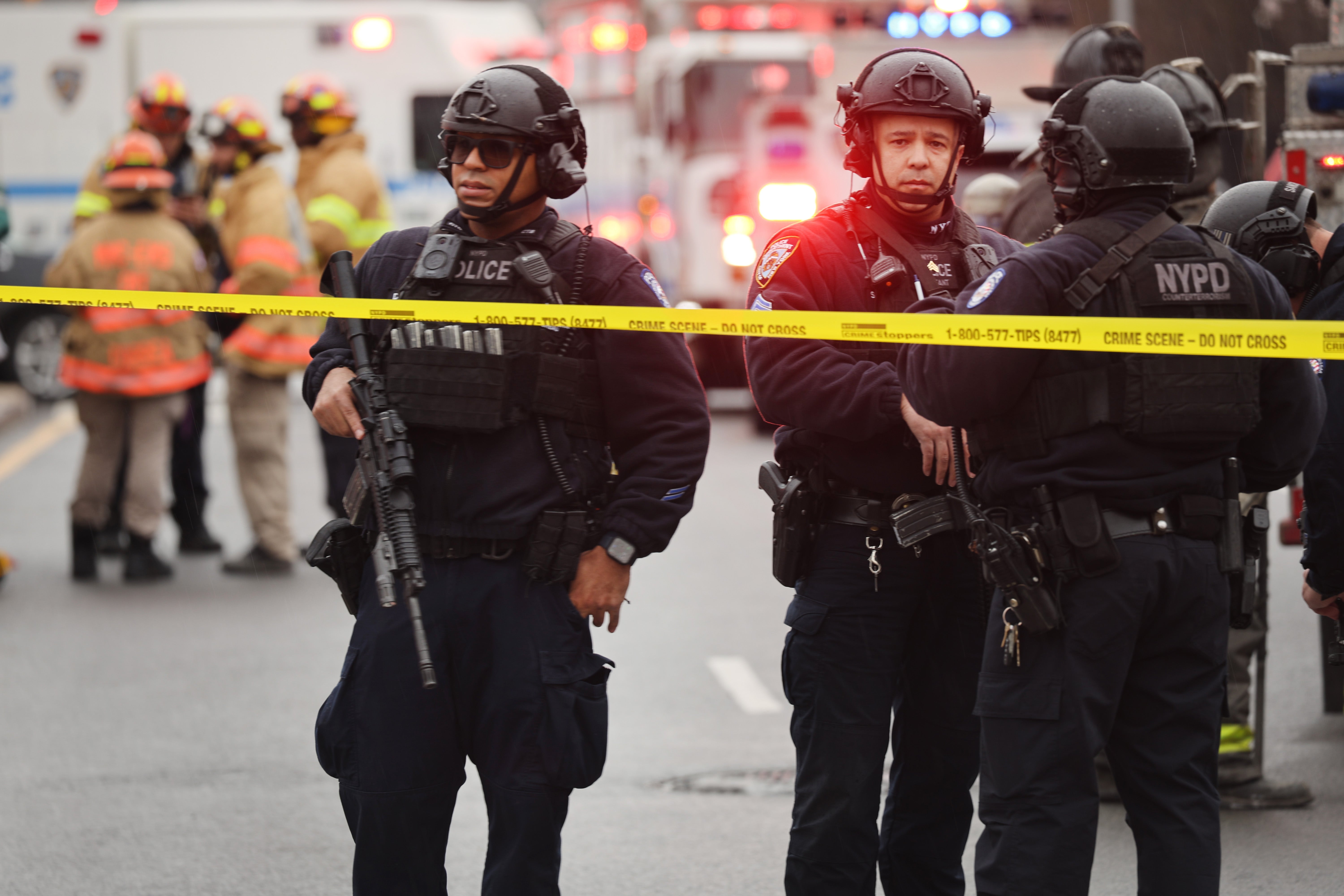 Police and emergency responders gather at the site of a reported shooting of multiple people outside of the 36 St subway station on April 12, 2022 in the Brooklyn borough of New York City