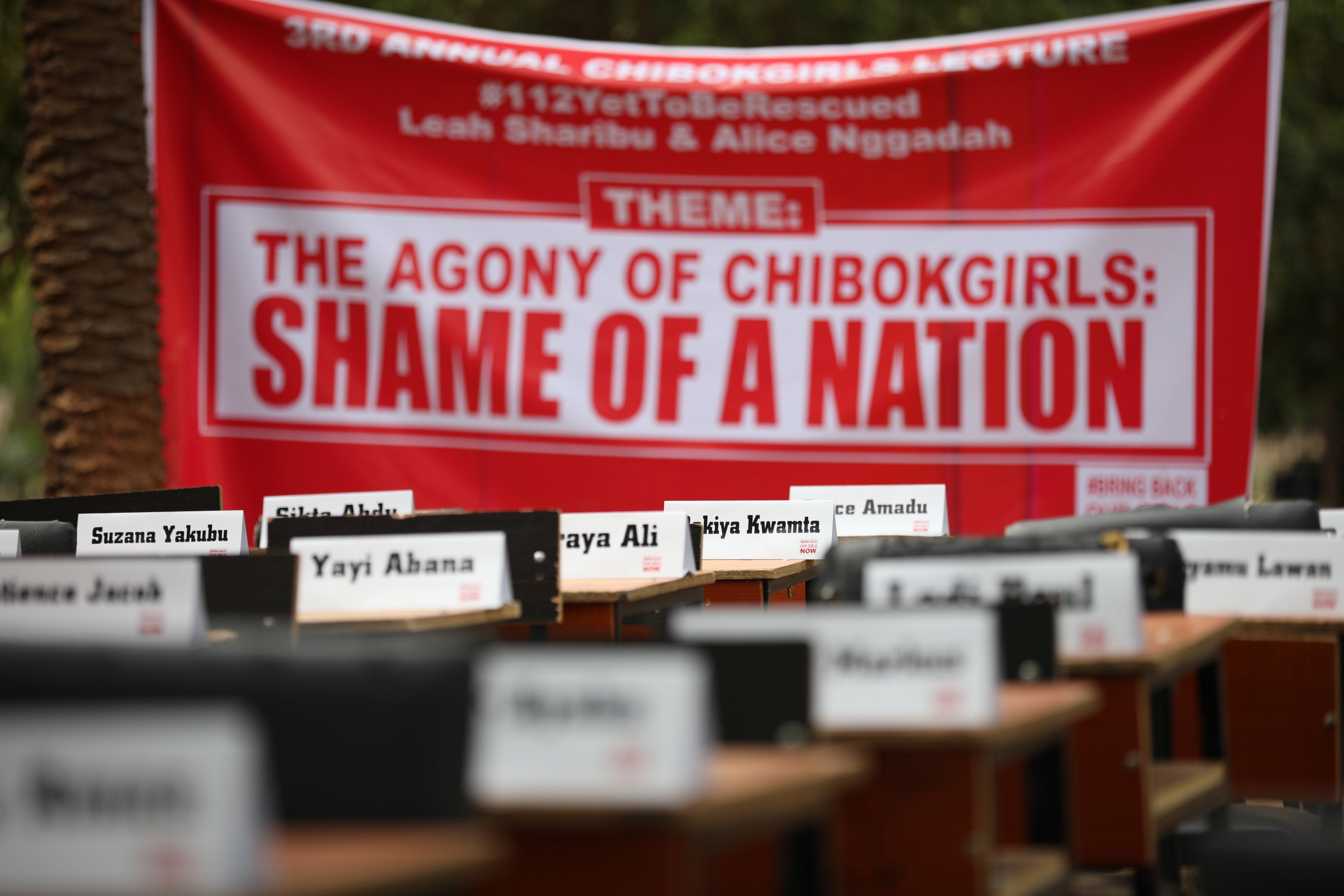 Names of the remaining Chibok schoolgirls are displayed with their desks at their school in Nigeria, 14 April, 2019