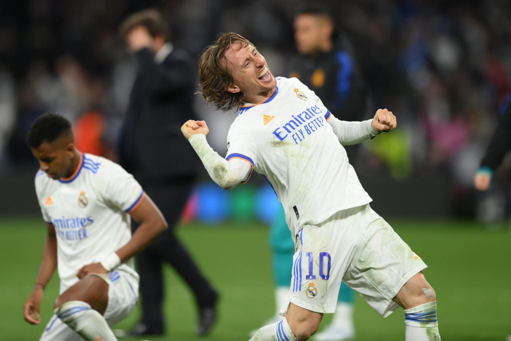 Madrid’s Luka Modric celebrates after his team’s aggregate victory