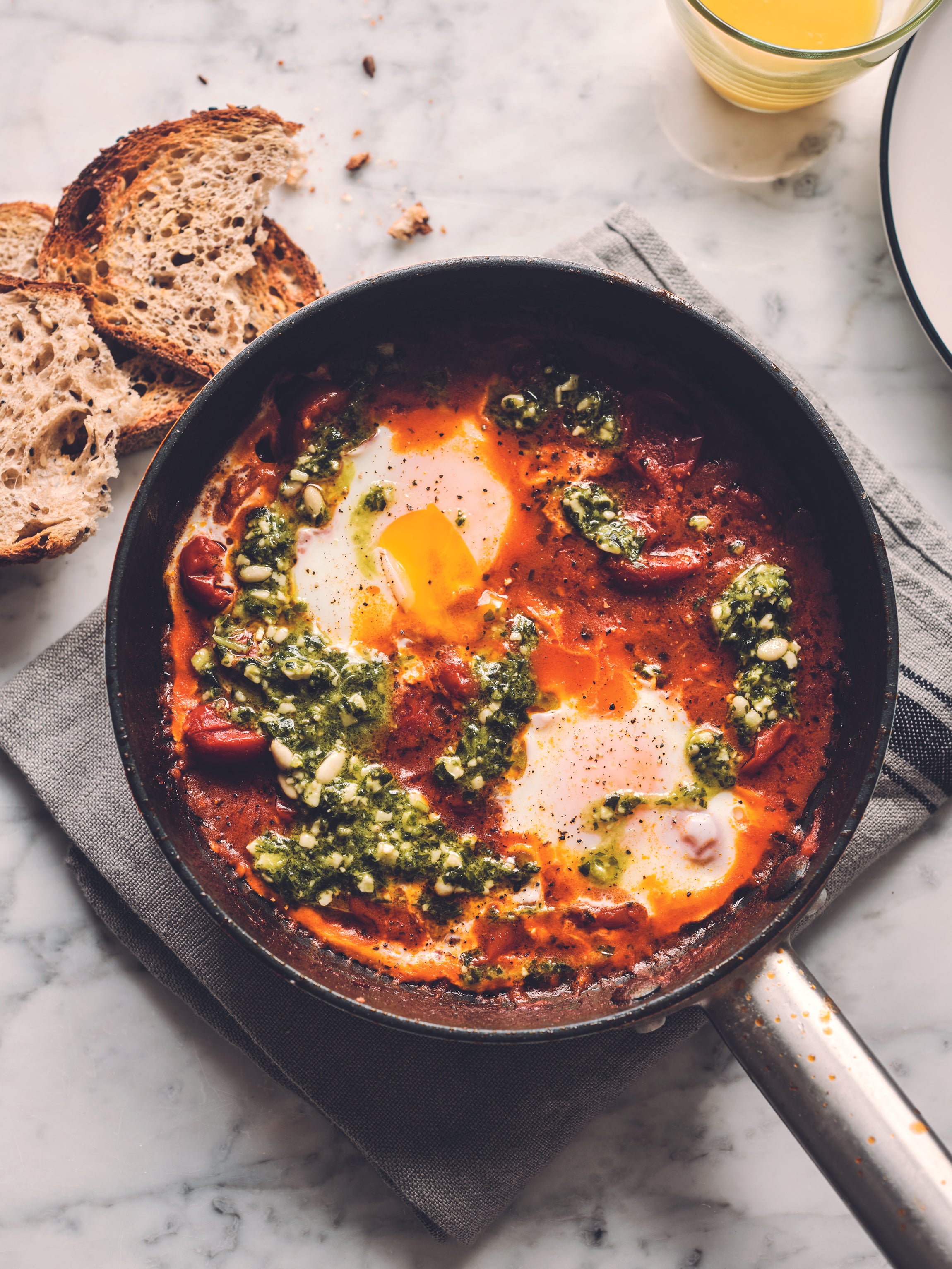 Pesto baked eggs from Easy (Haraala Hamilton/PA)