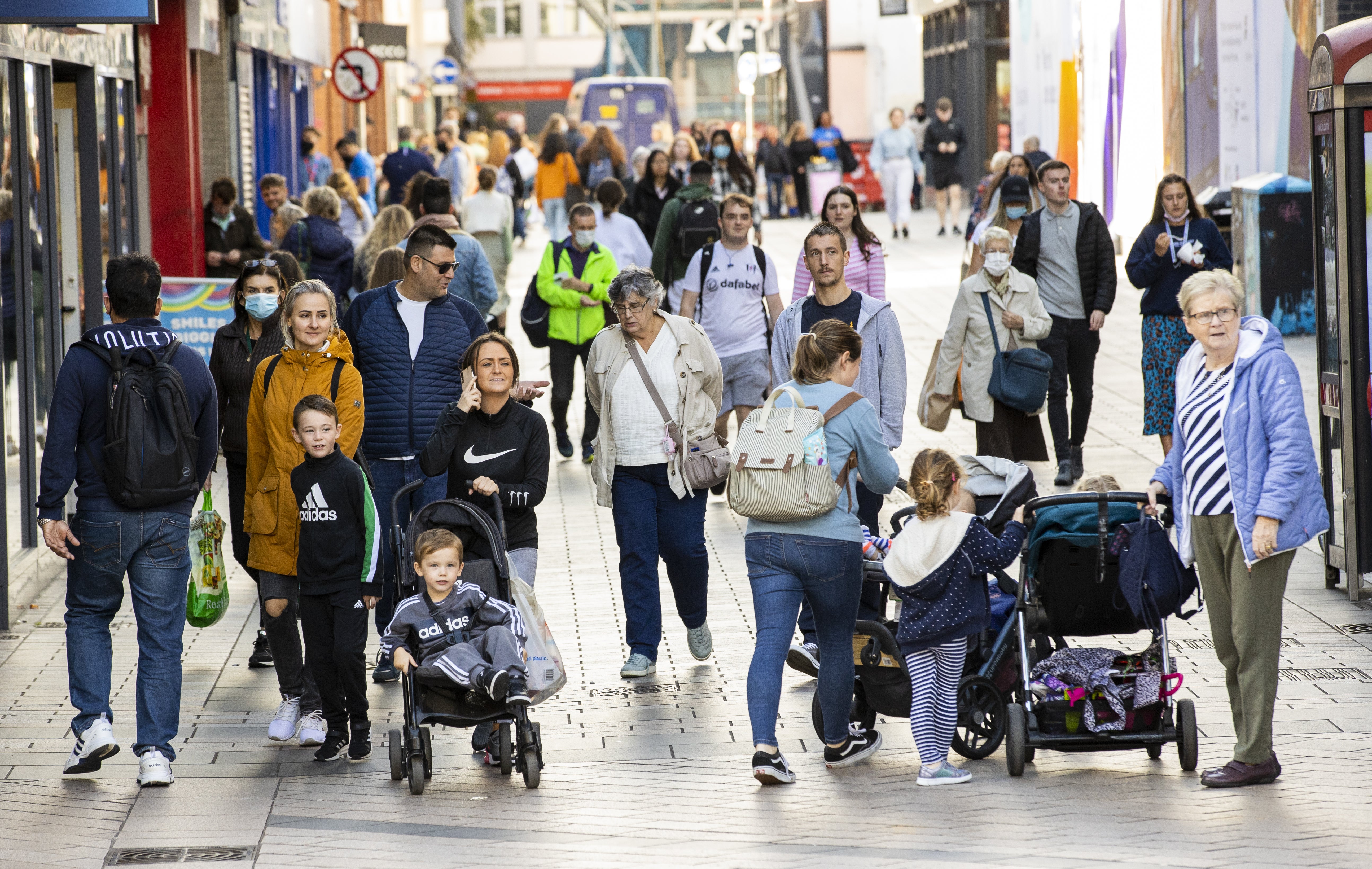 Shoppers on the high street in Belfast. (Liam McBurney/PA)