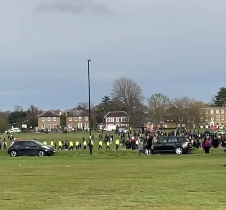 Officers diffuse a violent incident in a south London park