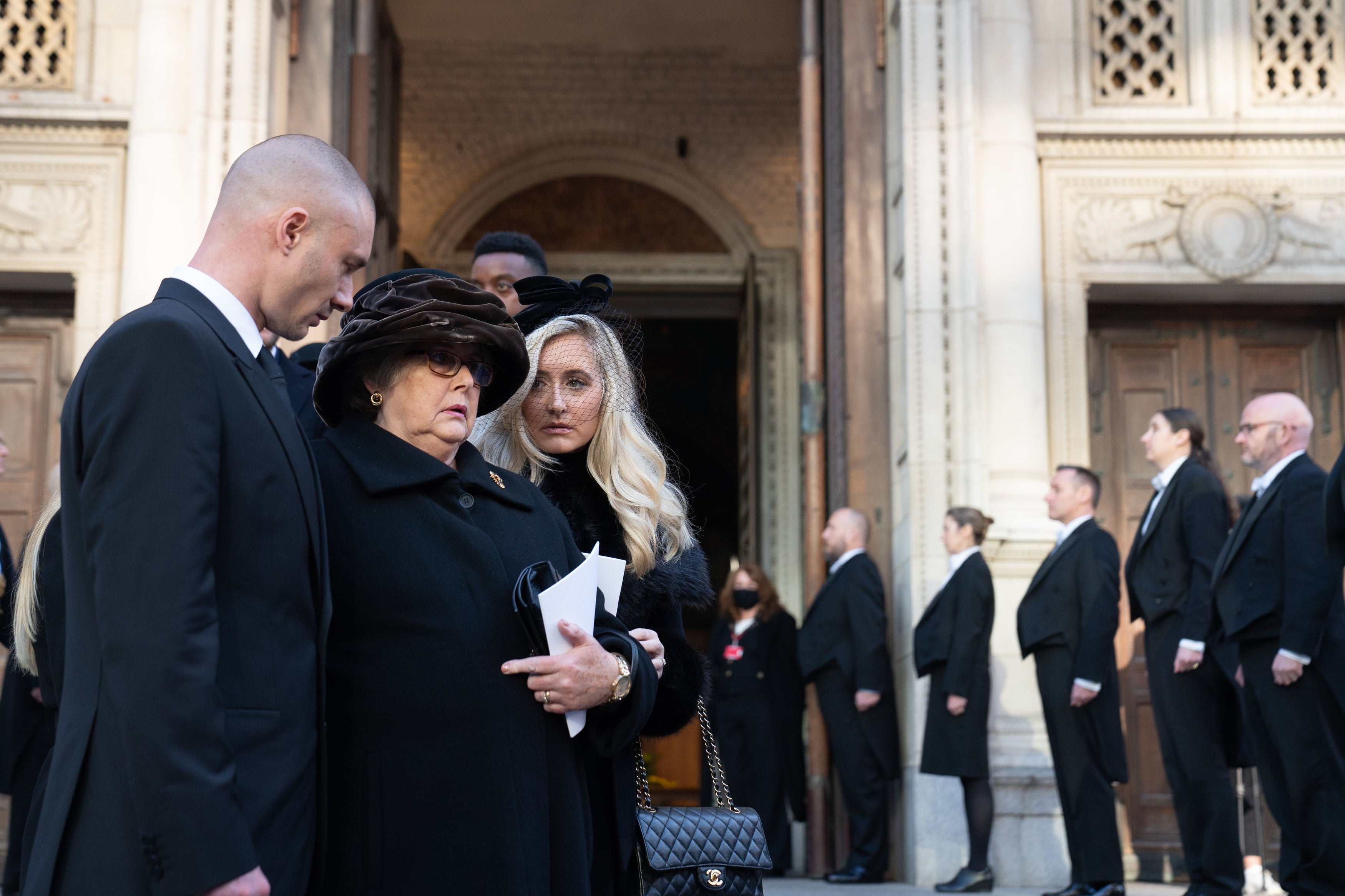 Lady Amess is comforted by her family after a memorial service for Sir David at Westminster Cathedral