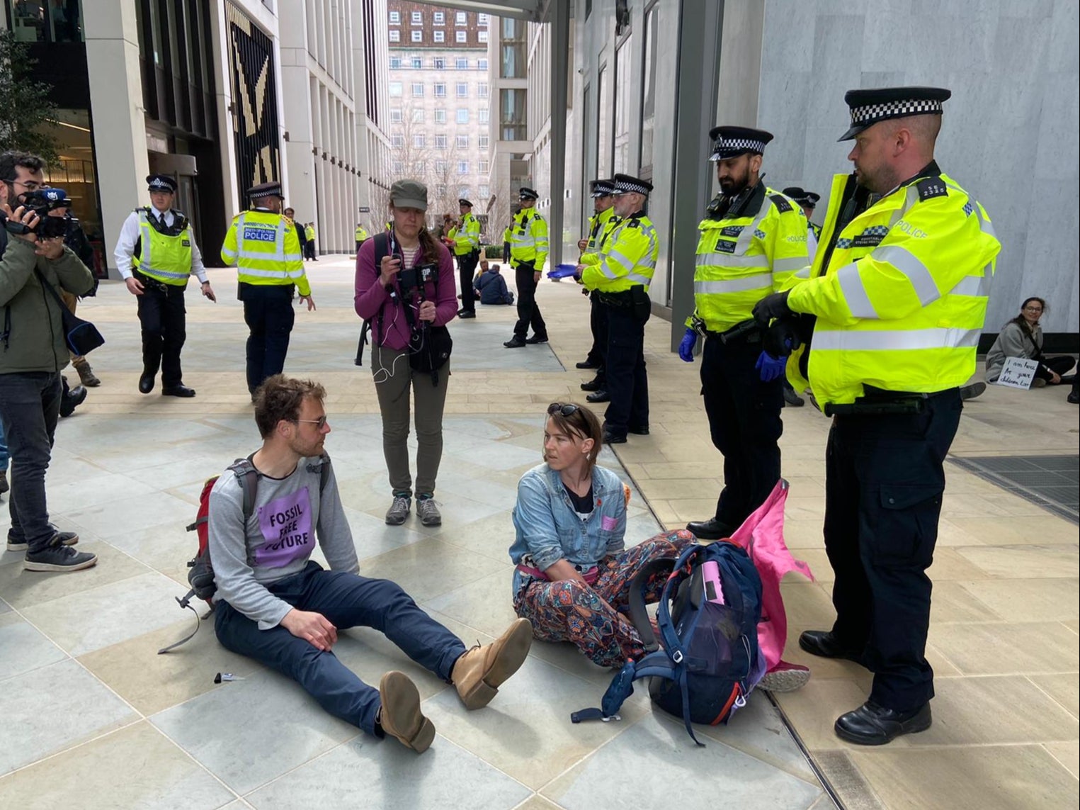 Michael, who did want to give his last name, and Addie May at the Shell HQ protest