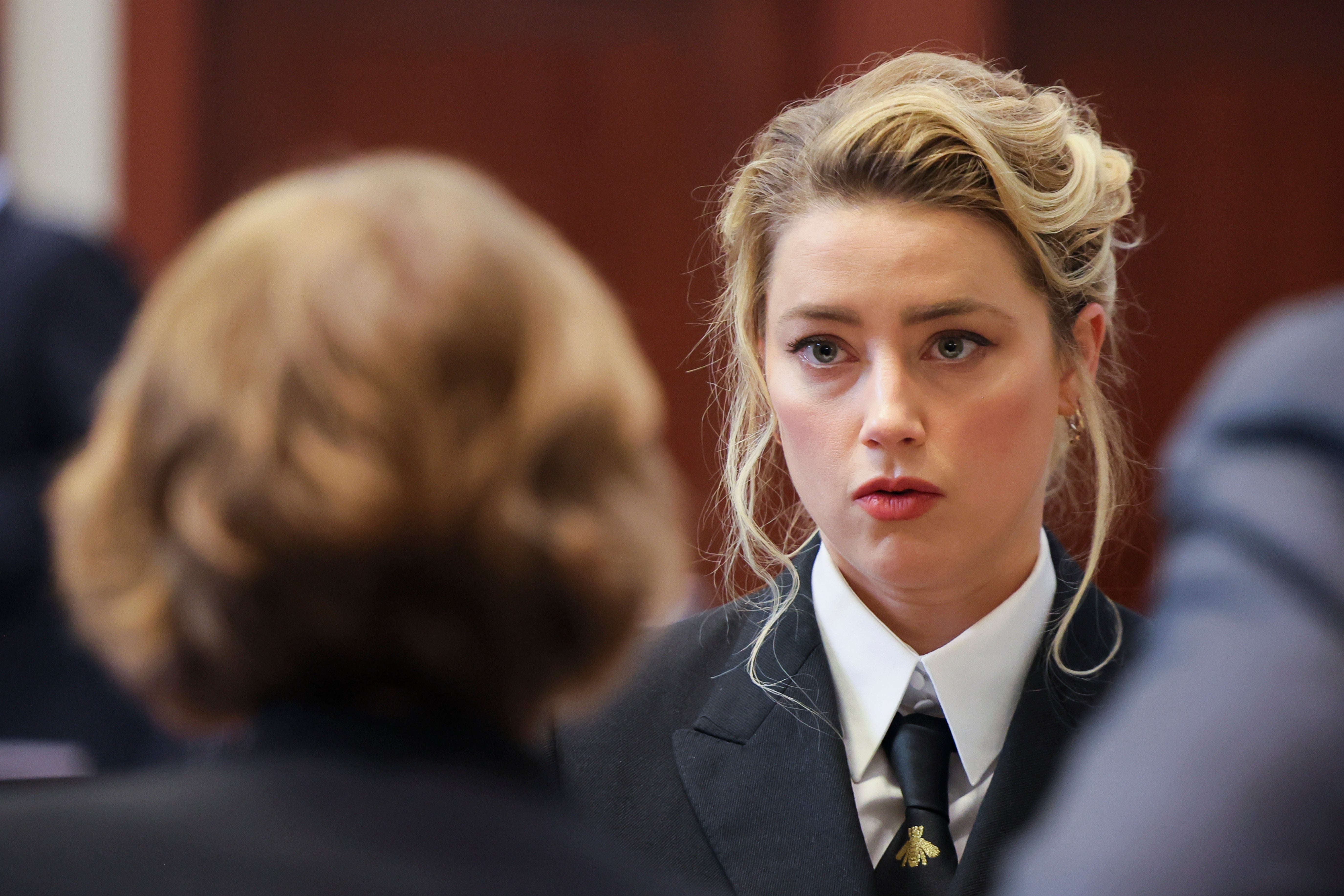 Amber Heard at the Fairfax County Circuit Courthouse (Evelyn Hockstein/Pool Photo via AP)