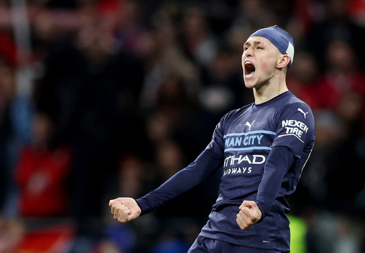 Phil Foden celebrates at the final whistle