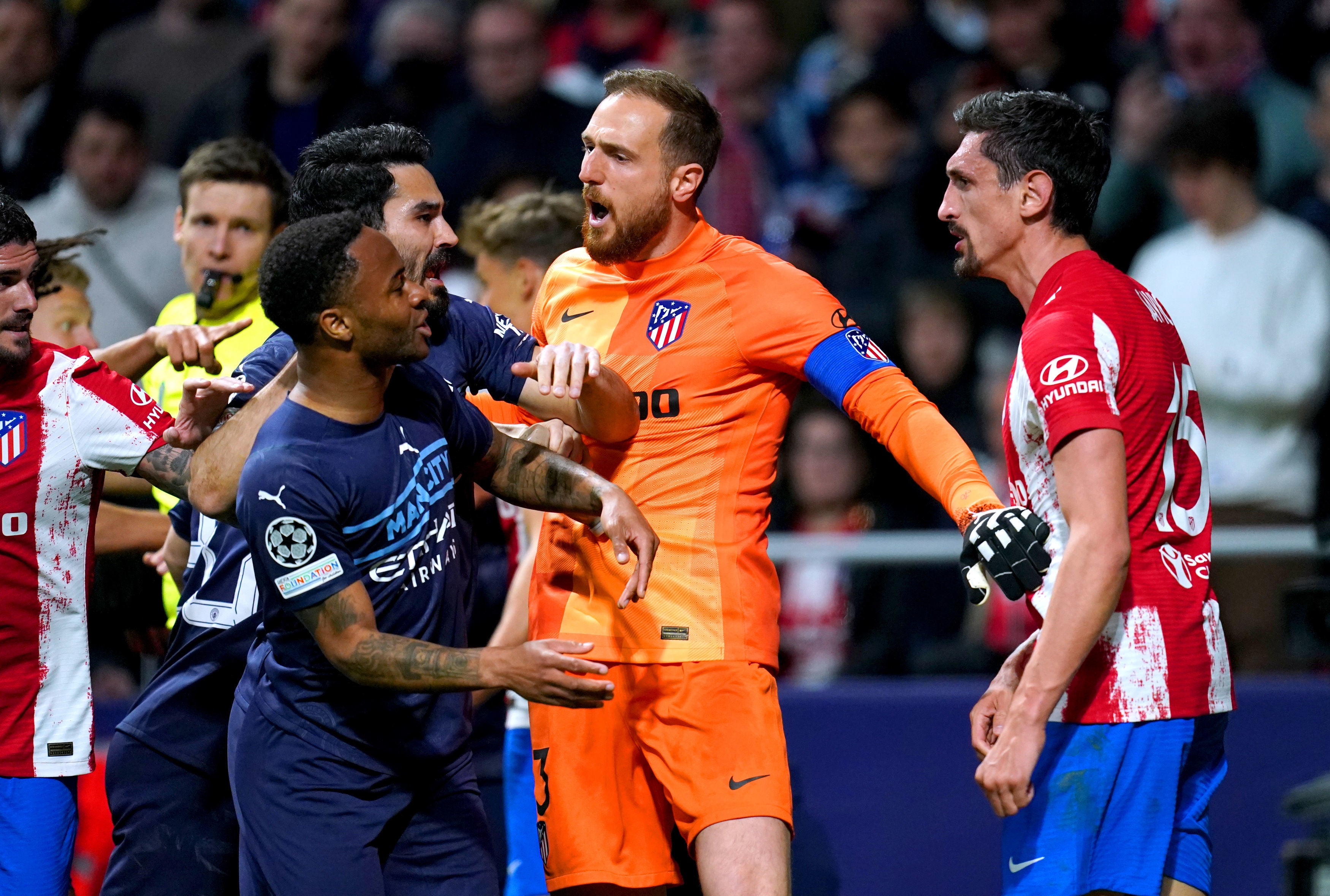 Stefan Savic, right, appeared to headbutt Raheem Sterling