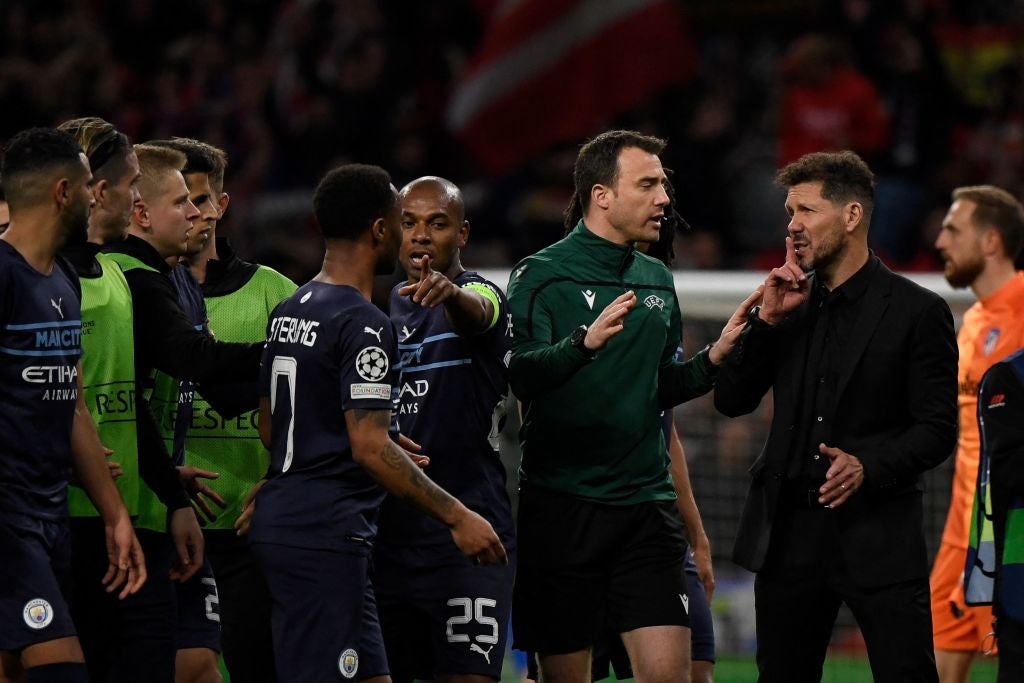 Simeone and City players after the heated fixture