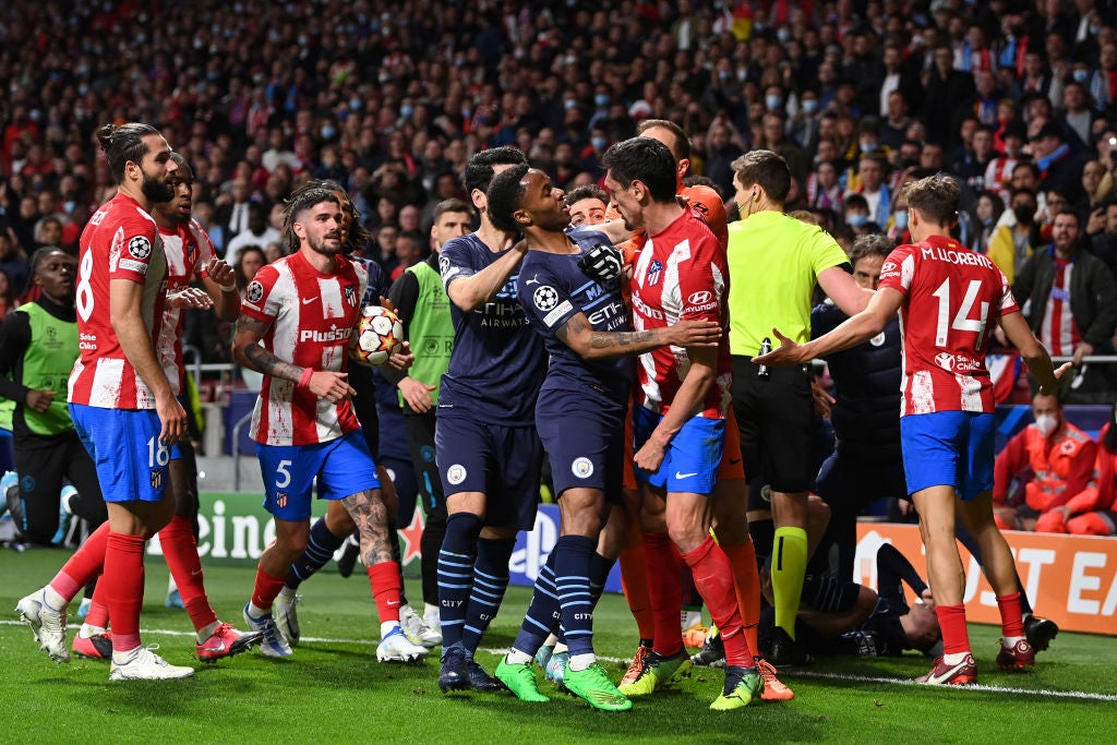 Raheem Sterling clashes with Jan Oblak and Stefan Savic during a bad tempered Champions League quarter final in Madrid