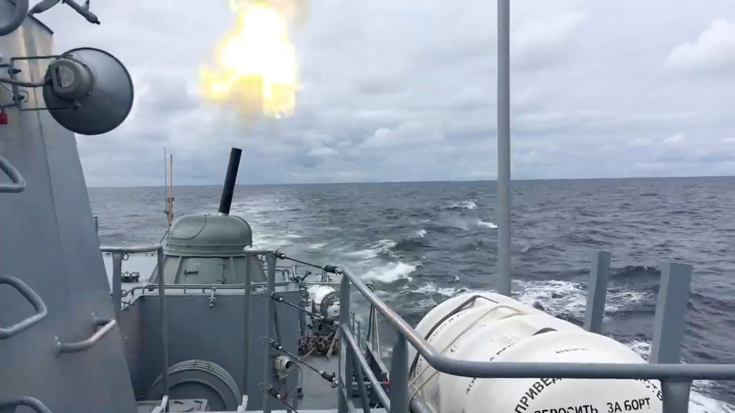 A view shows a warship of the Russian Navy during artillery fire drills in the Baltic Sea, in this still image taken from video released on 27 January