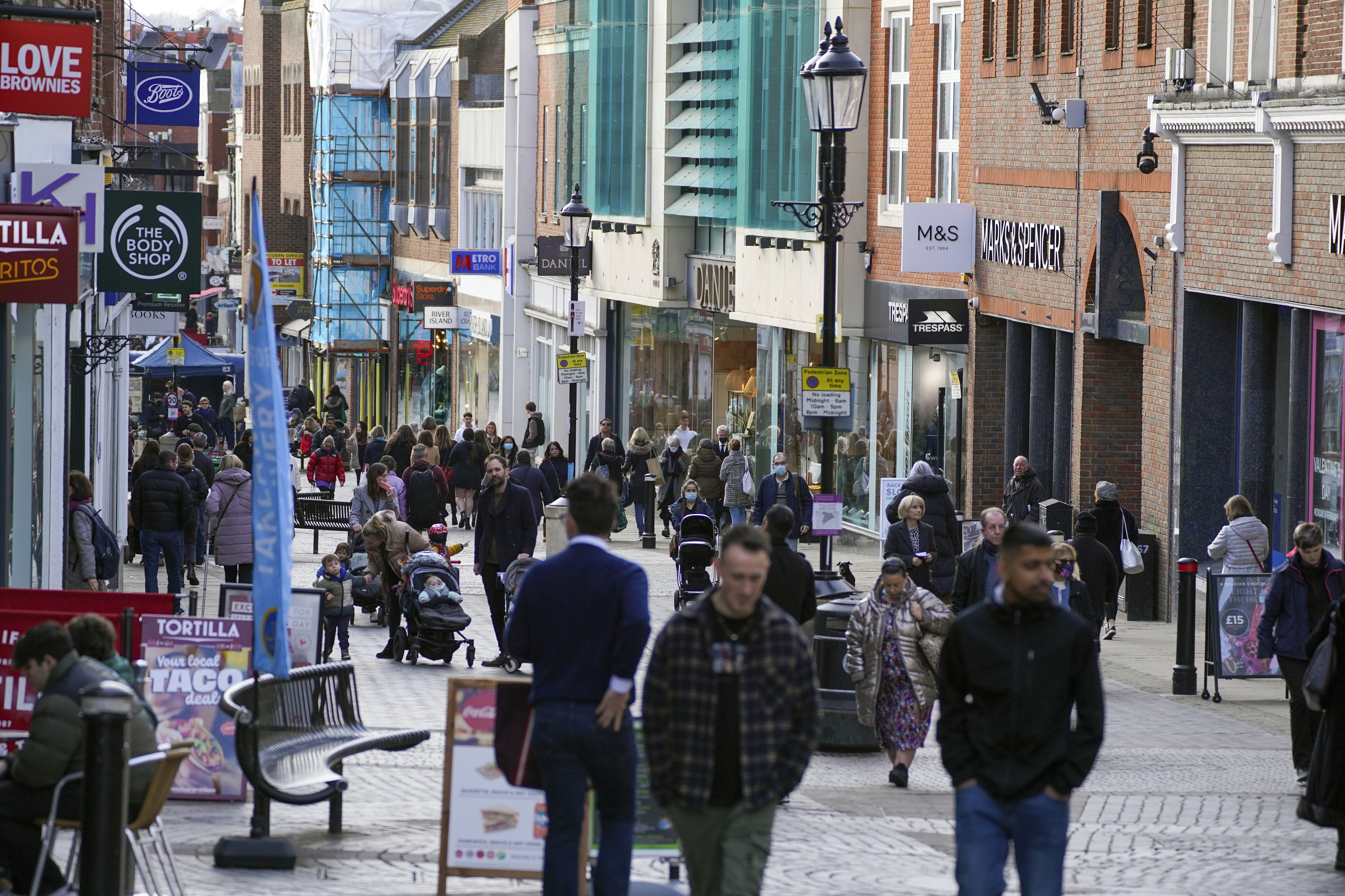 People walk along Peascod Street in Windsor, Berkshire (PA)