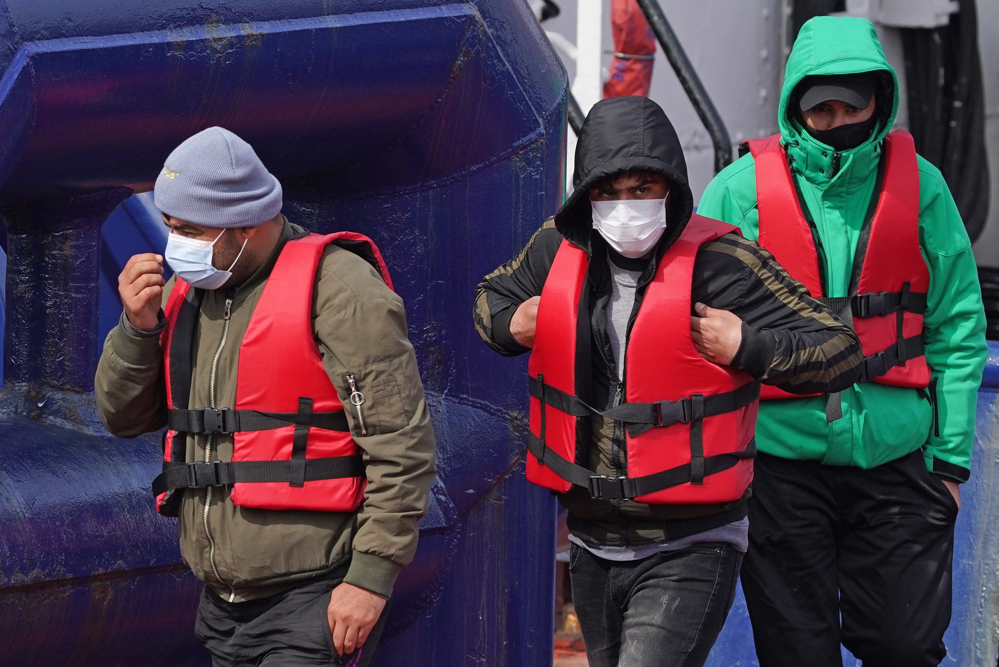 A group of people thought to be migrants are brought ashore in Dover, Kent (Gareth Fuller/PA)