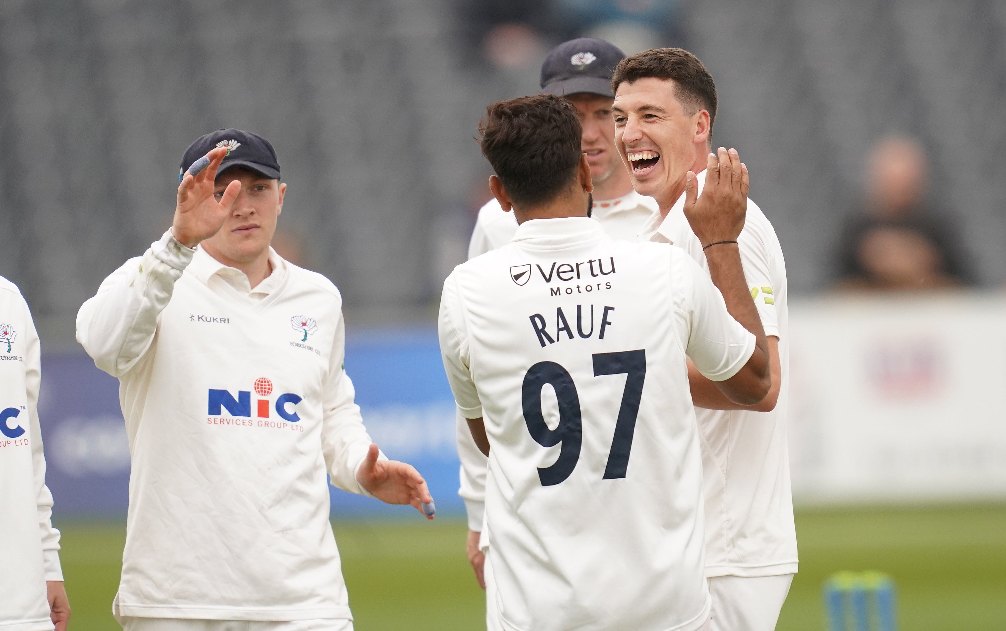 Yorkshire’s Matthew Fisher (right) celebrates one of his first four wickets against Gloucestershire (David Davies/PA)