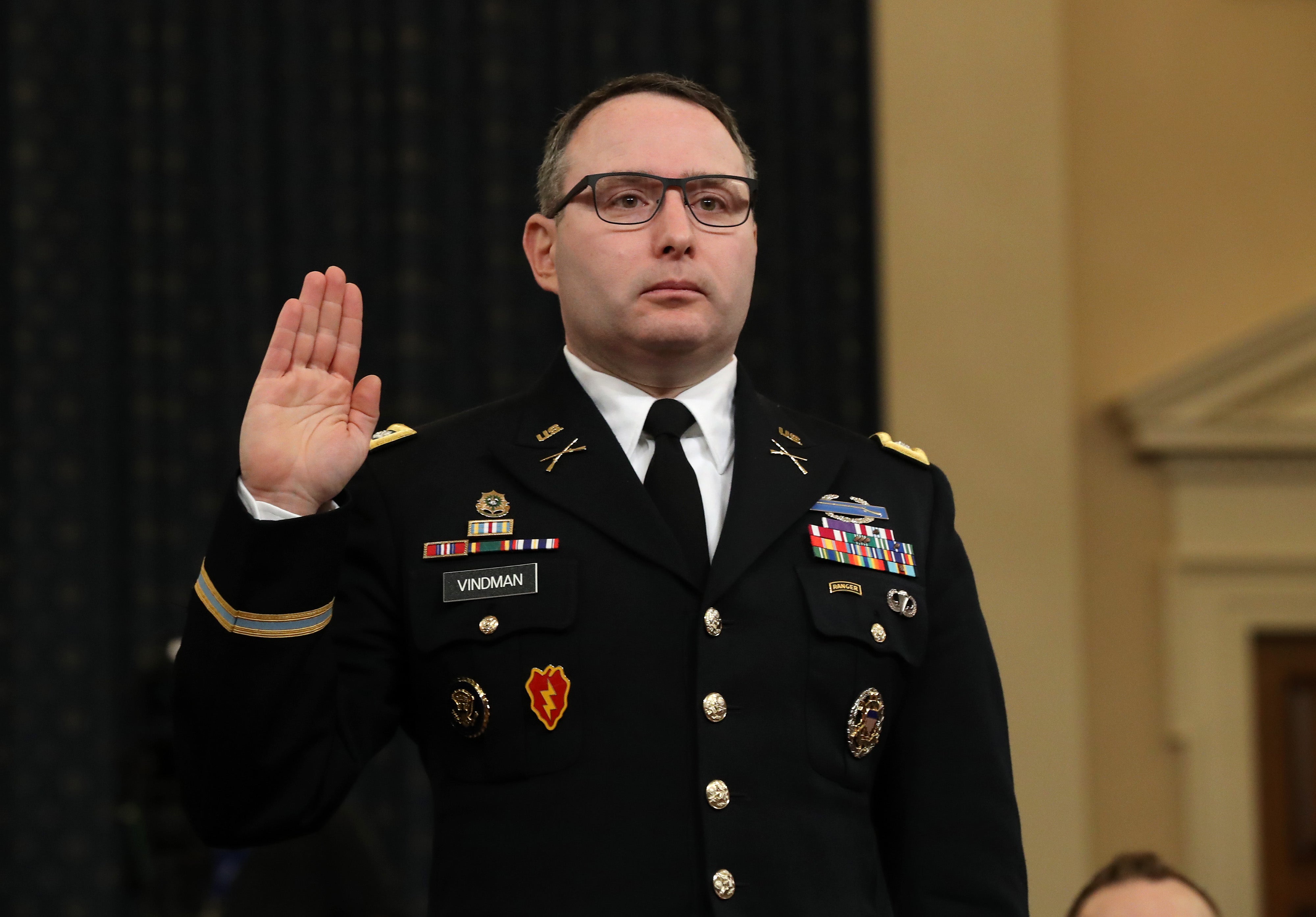 National Security Council Director for European Affairs Lt. Col. Alexander Vindman is sworn in to testify before the House Intelligence Committee in the Longworth House Office Building on Capitol Hill November 19, 2019 i