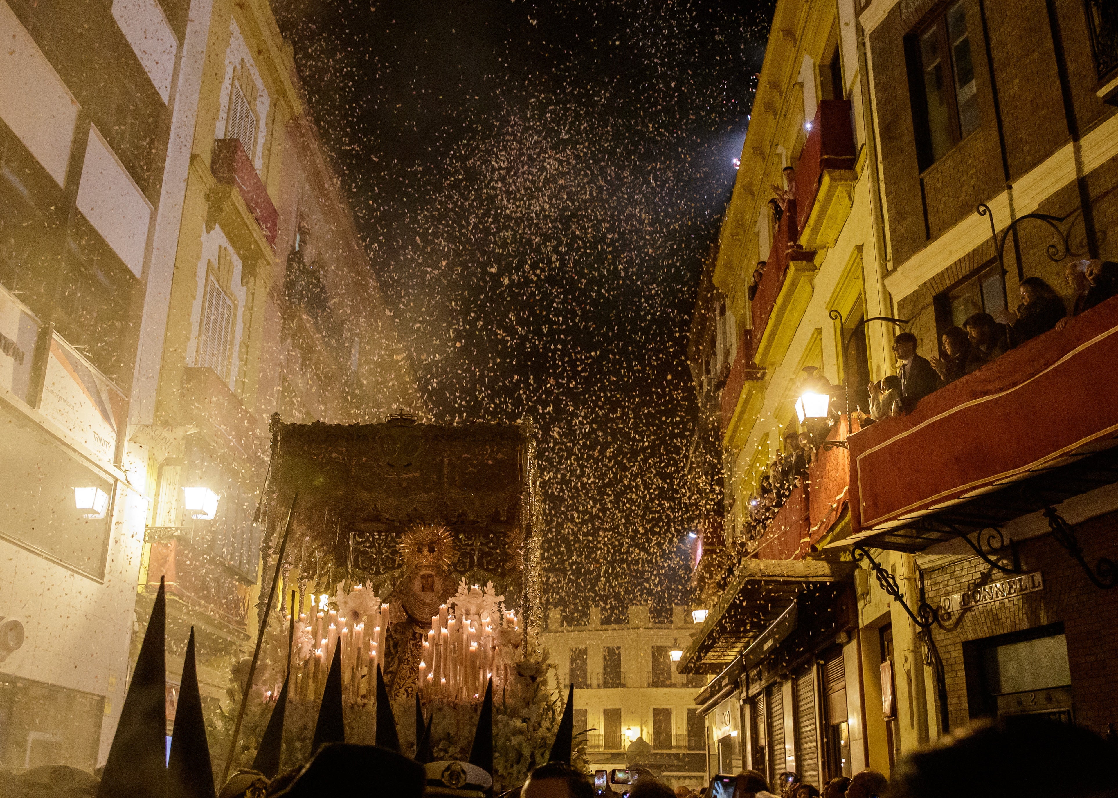 The float is carried through the Triana neighbourhood of Seville early on Good Friday