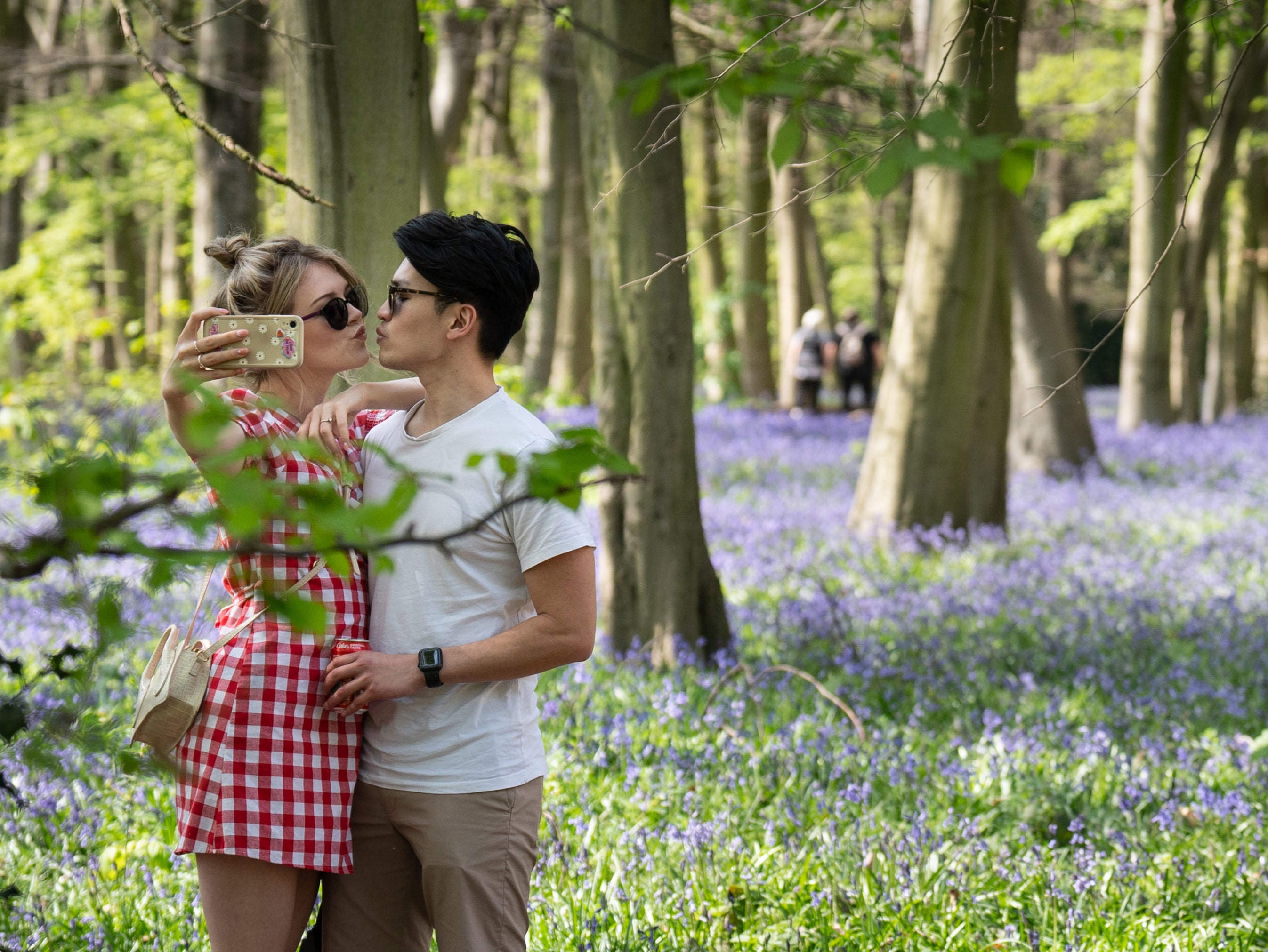 Visitors to Wanstead Park in northeast London among this year’s bluebells