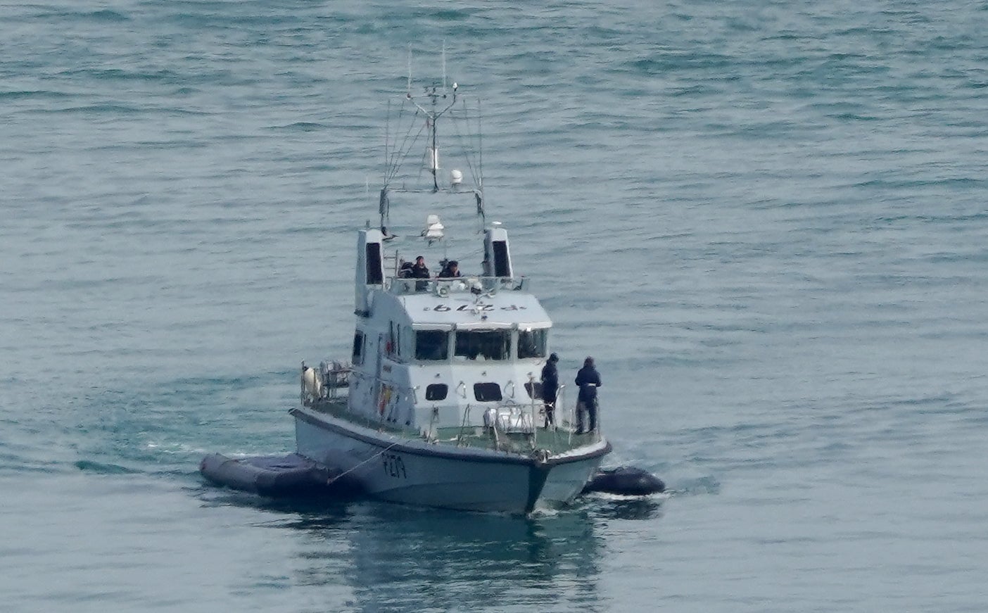 Royal Navy HMS Blazer tows two small boats as it arrives in Dover, Kent, following a number of small boat incidents in the Channel. Boris Johnson has put the Navy in command of the English Channel, as he defended plans to send some asylum seekers who make the crossing in small boats to Rwanda. Picture date: Thursday April 14, 2022.