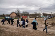 Ukrainian mom's pain at watching daughter's burial on phone