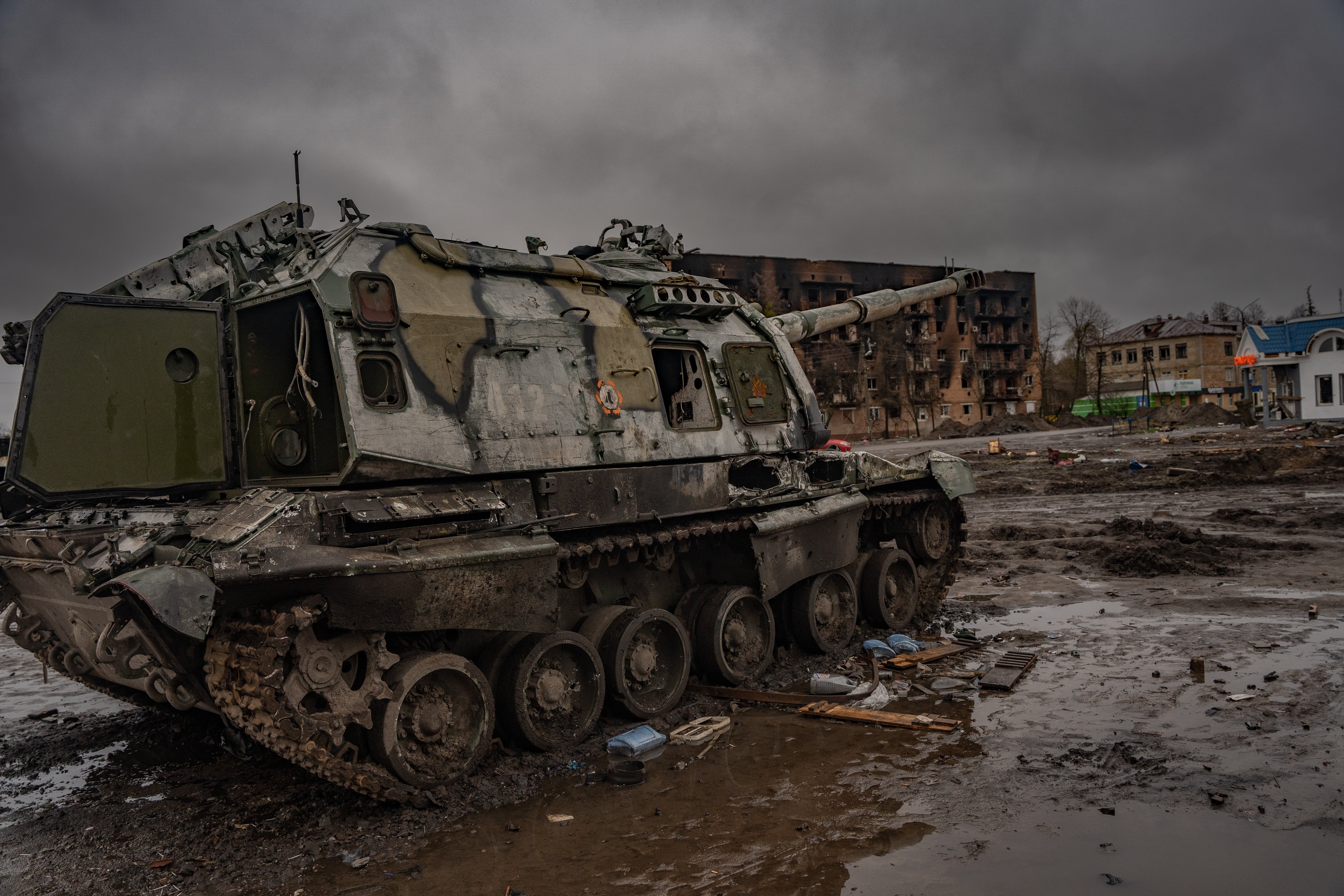 Destroyed Russian artillery sits in the mud outside Trostyanets railway station – the site of a fierce battle