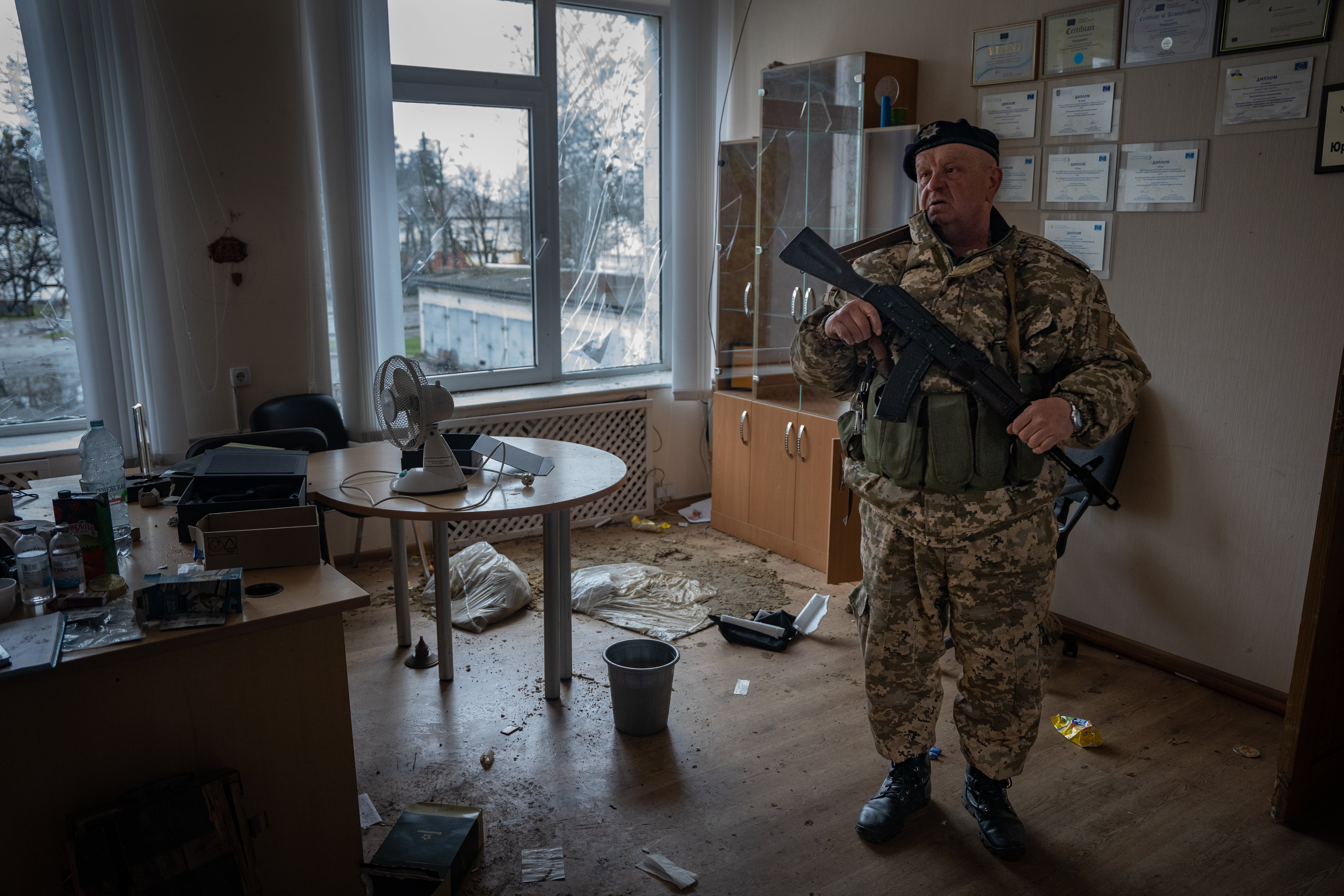 Anatoliy, a former USSR soldier and Chernobyl liquidator at the destroyed administration building