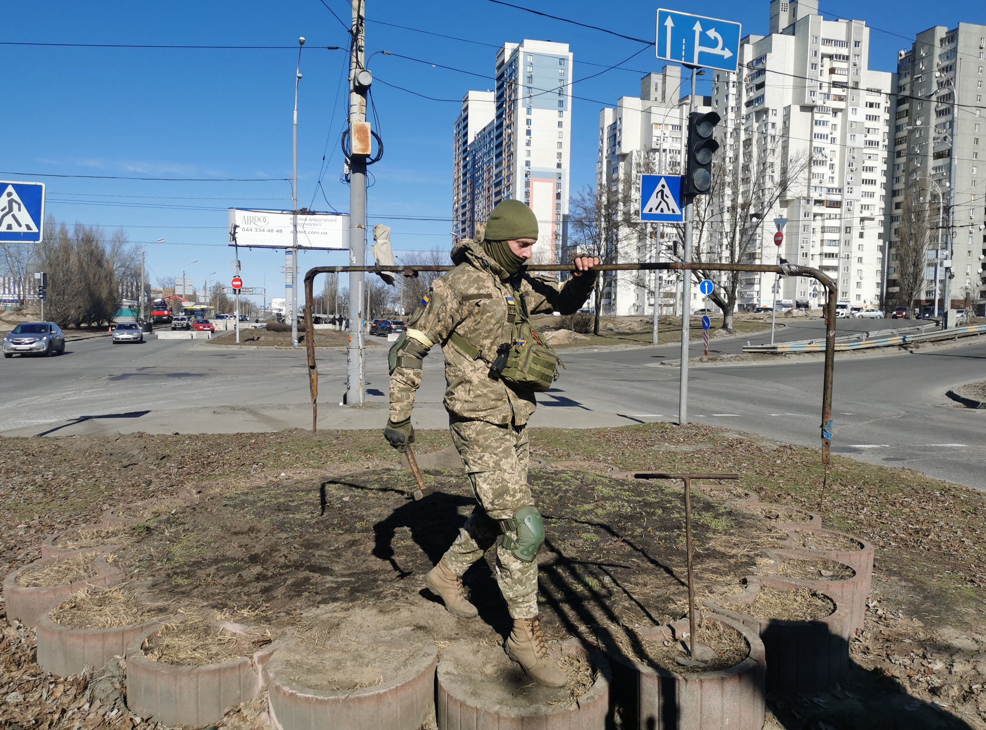 A Kyiv resident and volunteer prepares a rear post with trenches in Kyiv, 28 February 2022