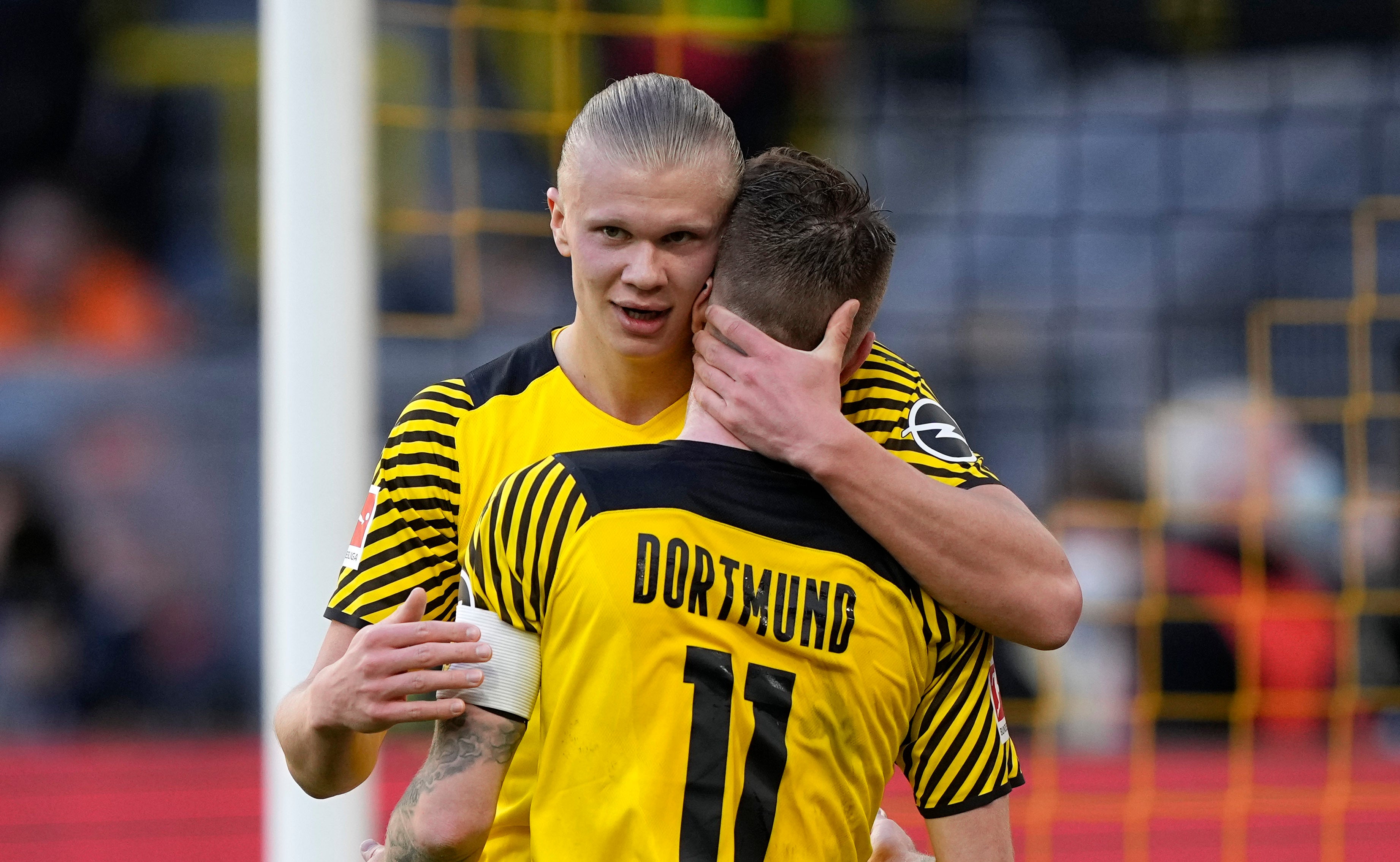 Dortmund striker Erling Haaland (left) struck twice as Wolfsburg were swept aside (Martin Meissner/AP)