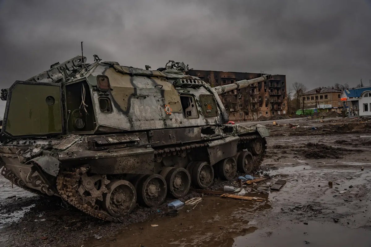 Destroyed Russian artillery sits in the mud outside Trostyanets railway station – the site of a fierce battle