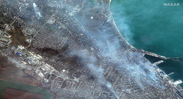 Maxar satellite imagery of buildings on fire in western Mariupol