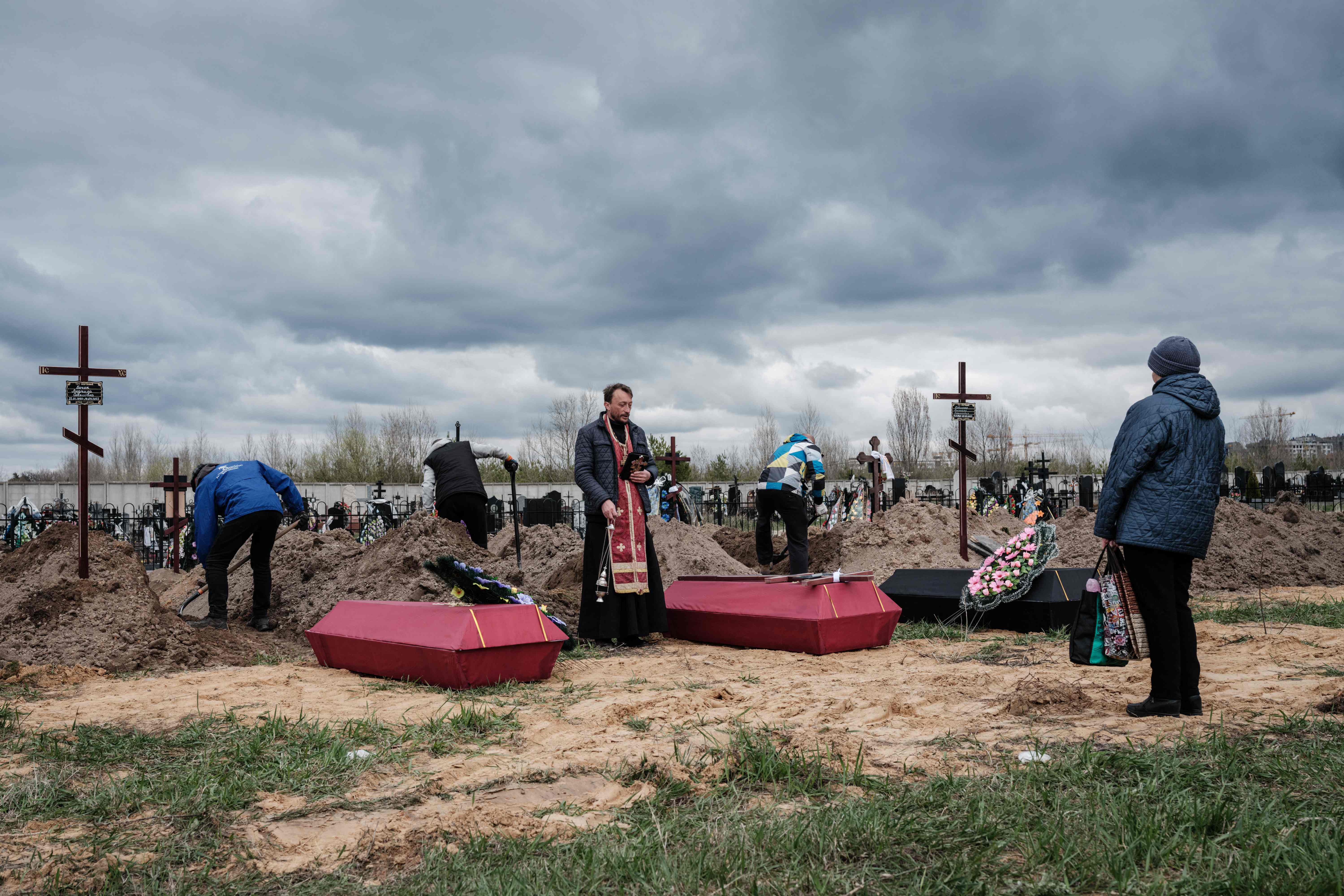 A funeral held for Bucha victims killed in a Russian attack