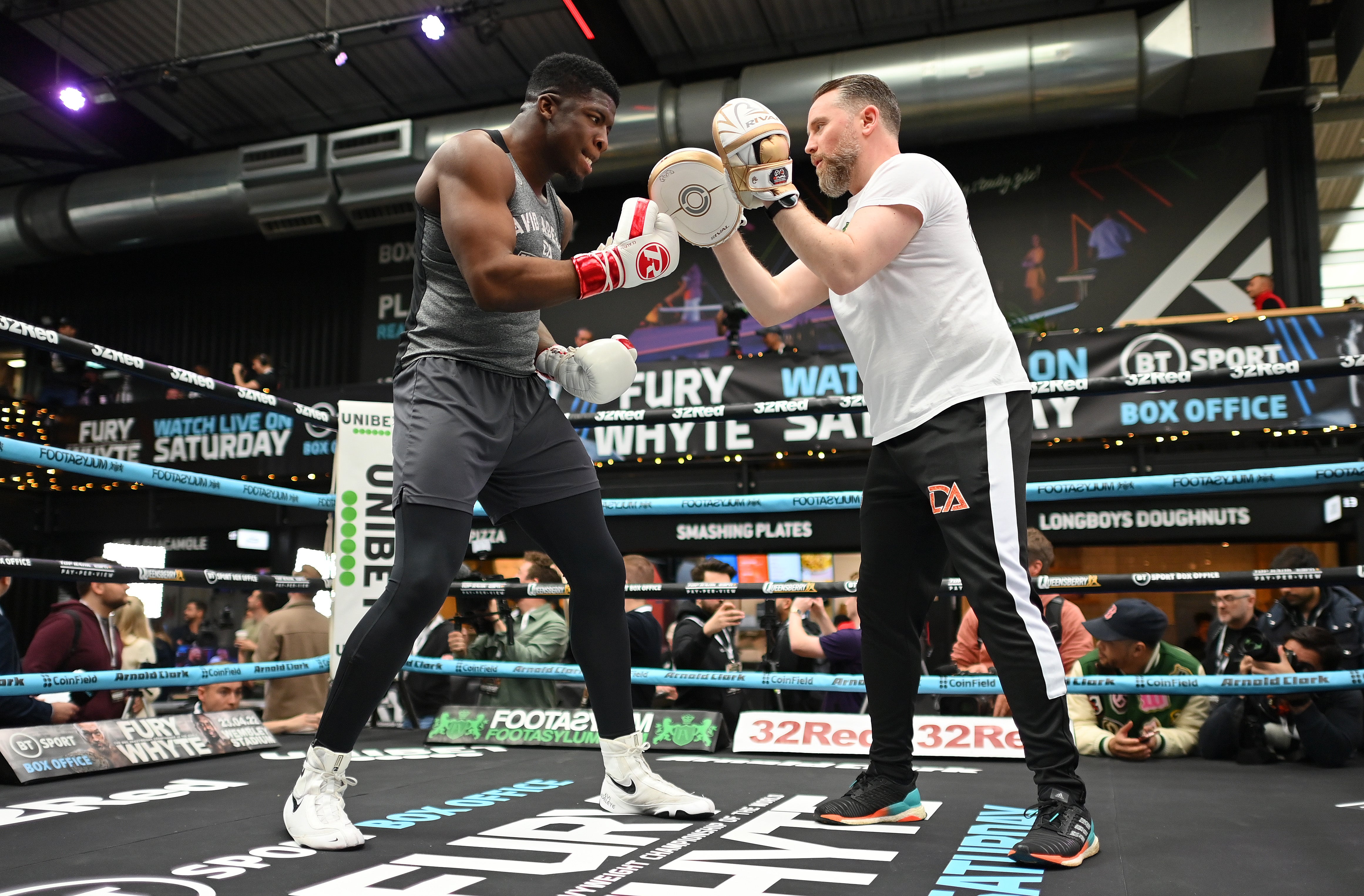 David Adeleye trains with head coach Frank Greaves