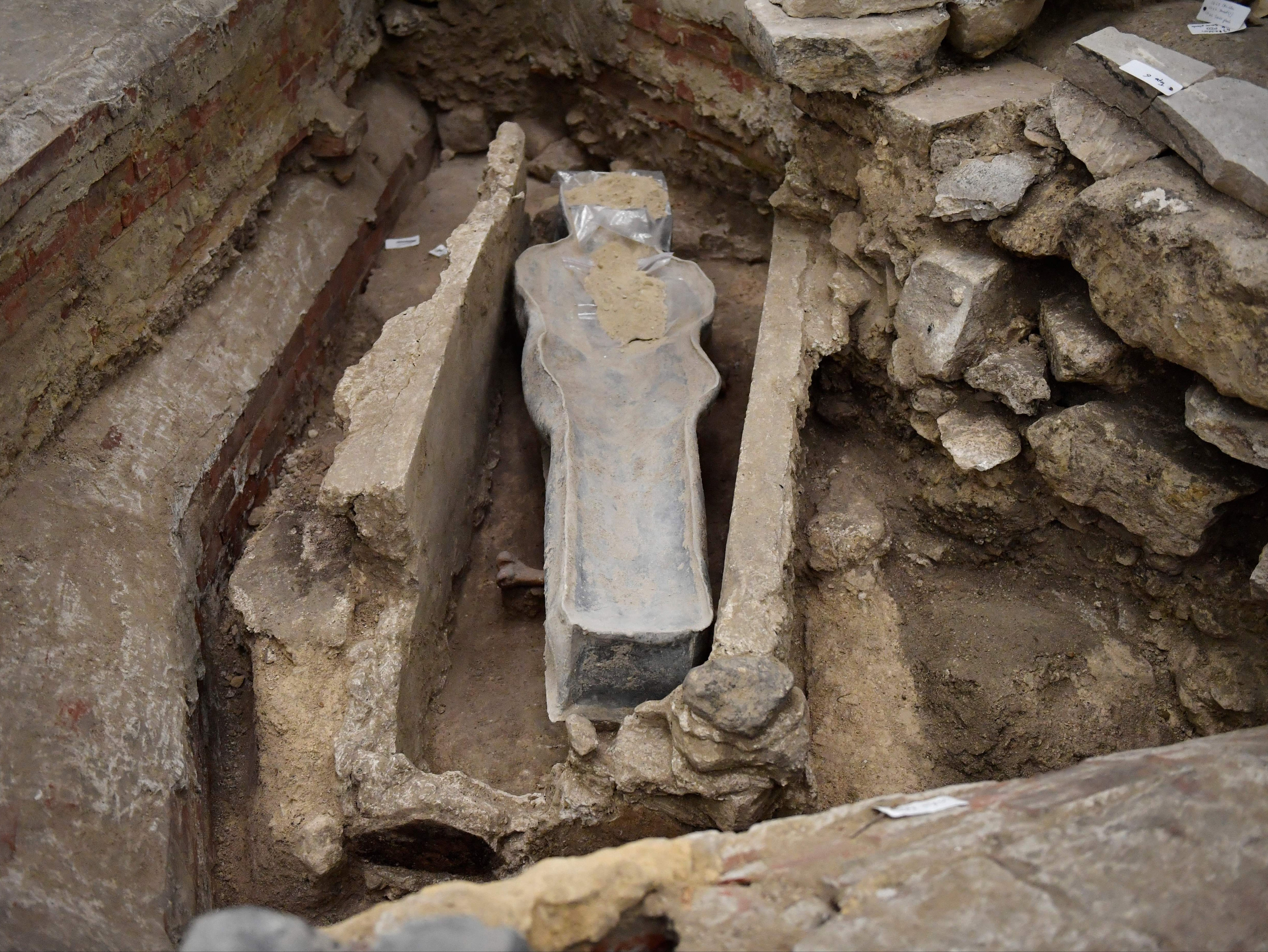 A 14th century lead sarcophagus was discovered in the floor of Notre Dame Cathedral in Paris
