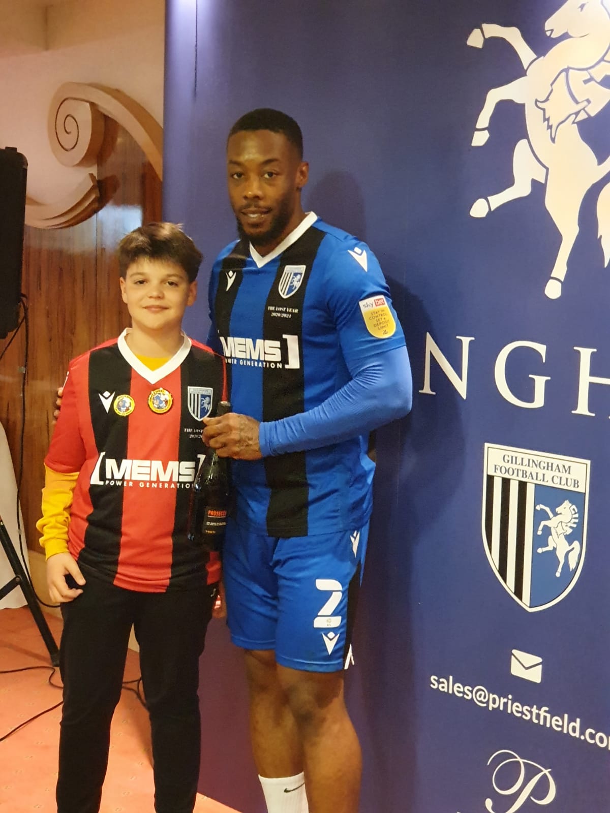 Ukrainian refugee Daniel Lysak with Gillingham player Ryan Jackson (Malcolm Bell)