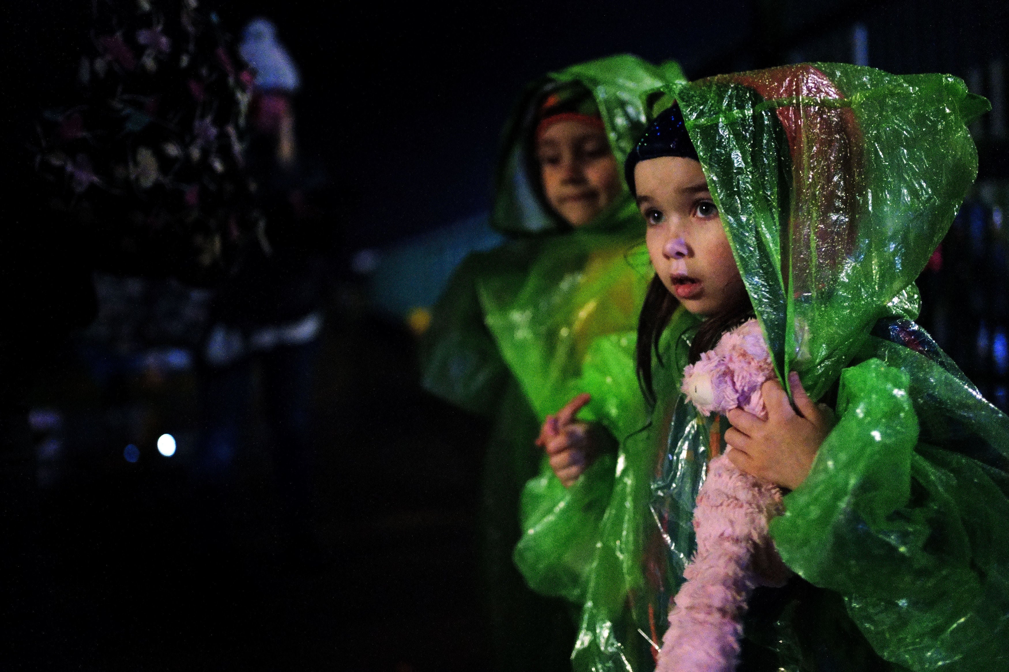 Young Ukrainian refugees passes through the final gate to Poland after crossing the border point from Ukraine