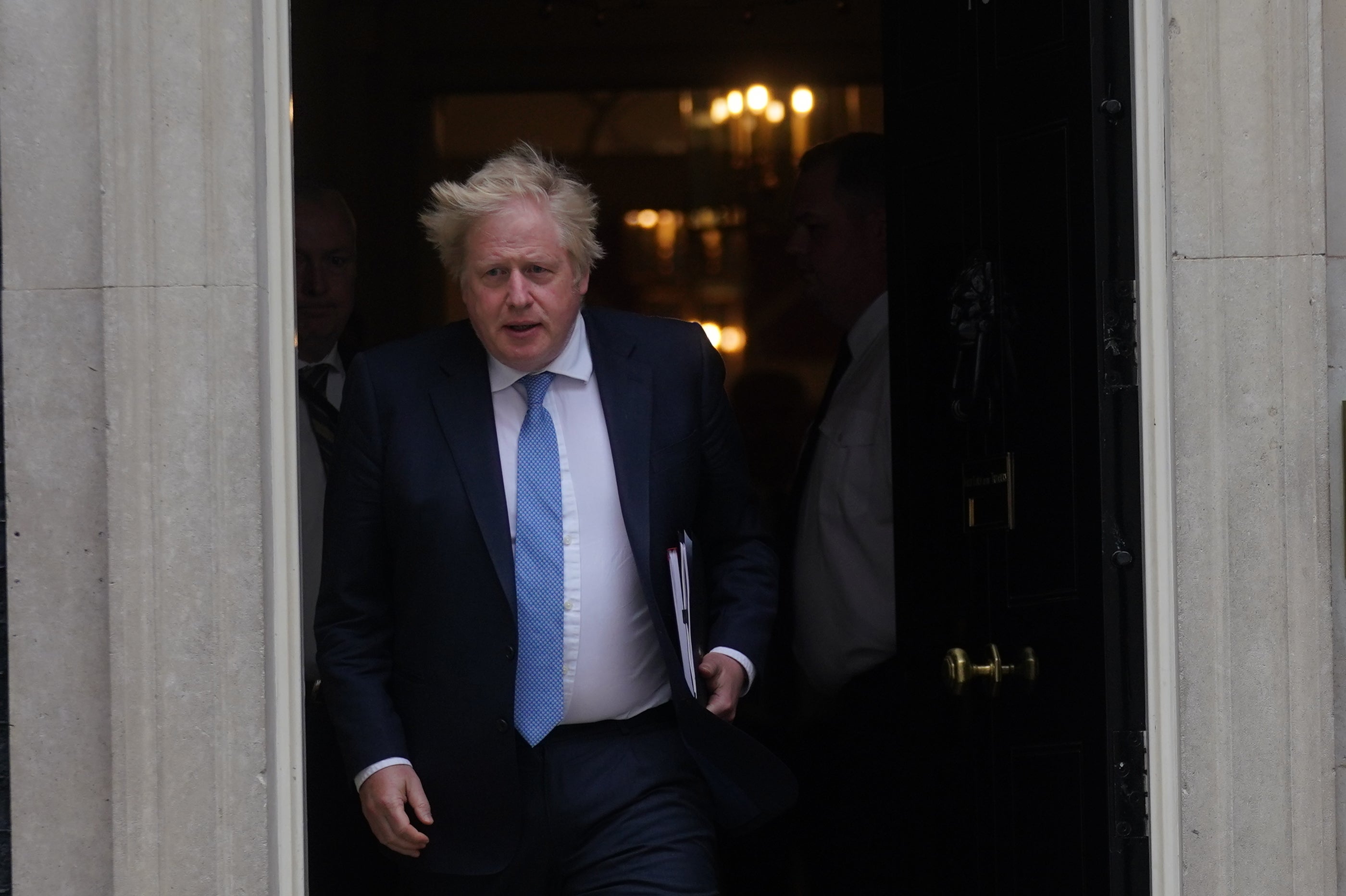 Prime Minister Boris Johnson leaving No 10 to address MPs (Victoria Jones/PA)