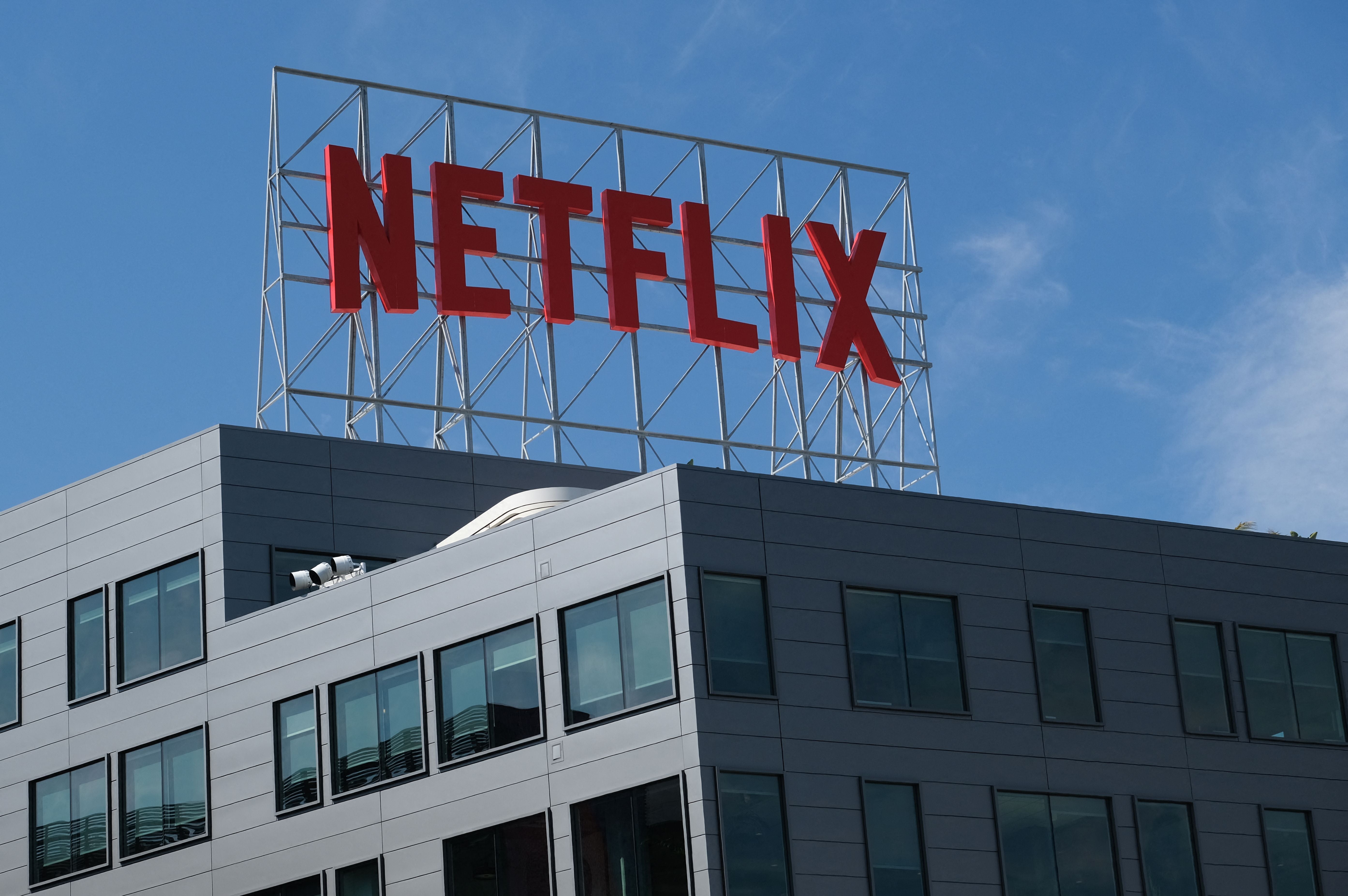 The Netflix logo is seen on top of their office building in Hollywood, California, 2 March 2022