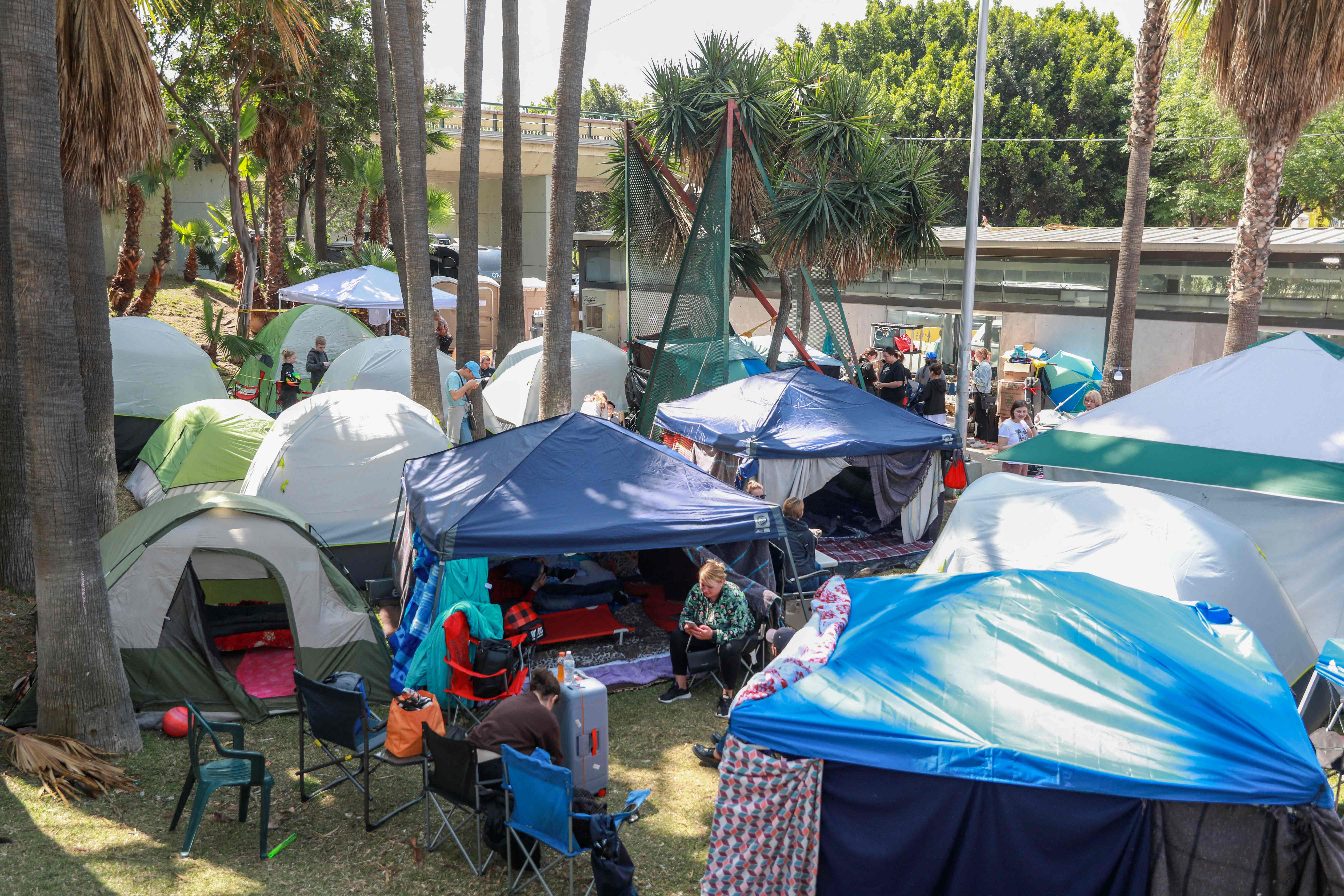 Hundreds of Ukrainians are waiting at an encampment in Tijuana, south of San Diego hoping to seek US asylum