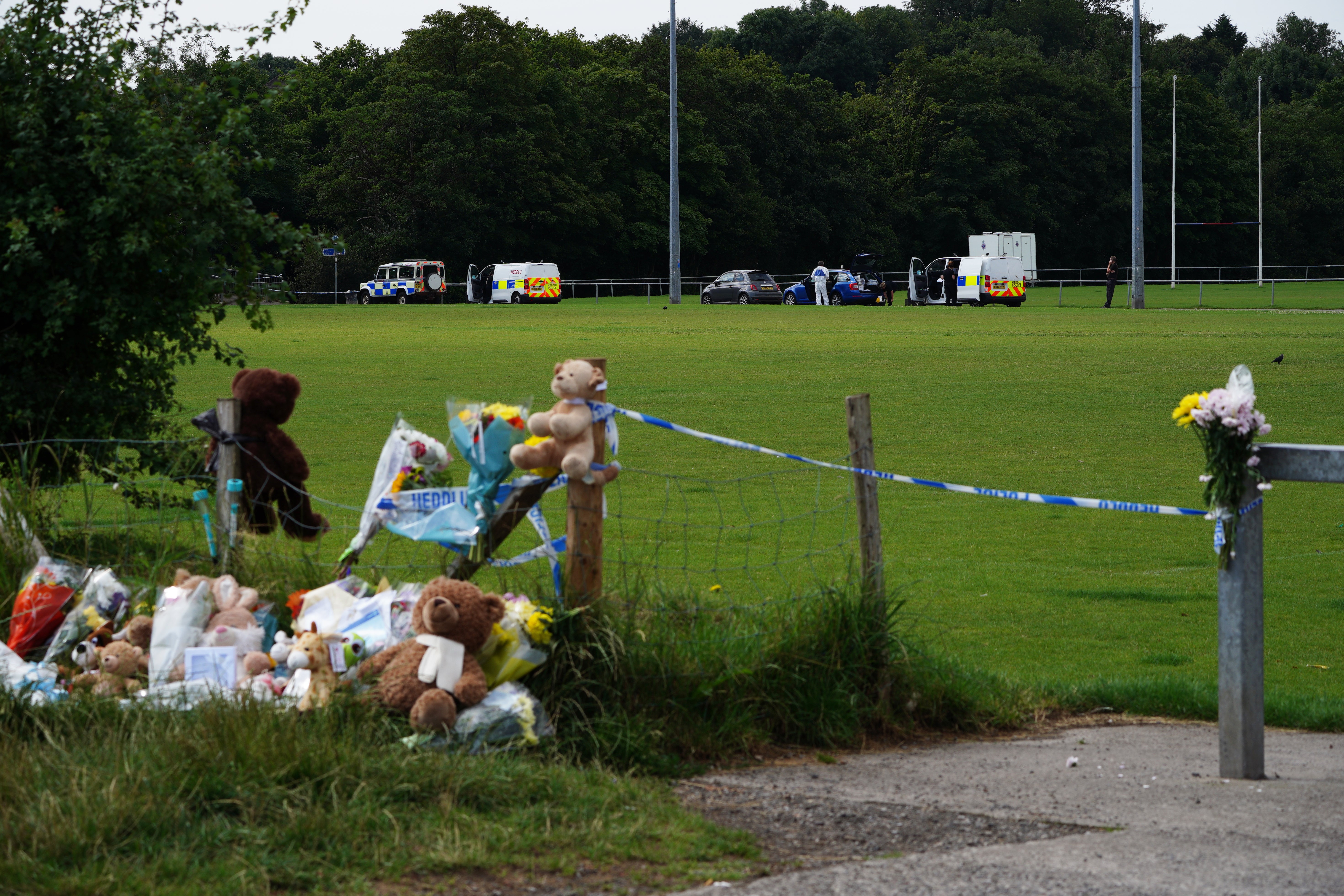 Tributes left at the scene in the Sarn area of Bridgend, south Wales, near to where five-year-old Logan Mwangi was found dead (Ben Birchall/PA)