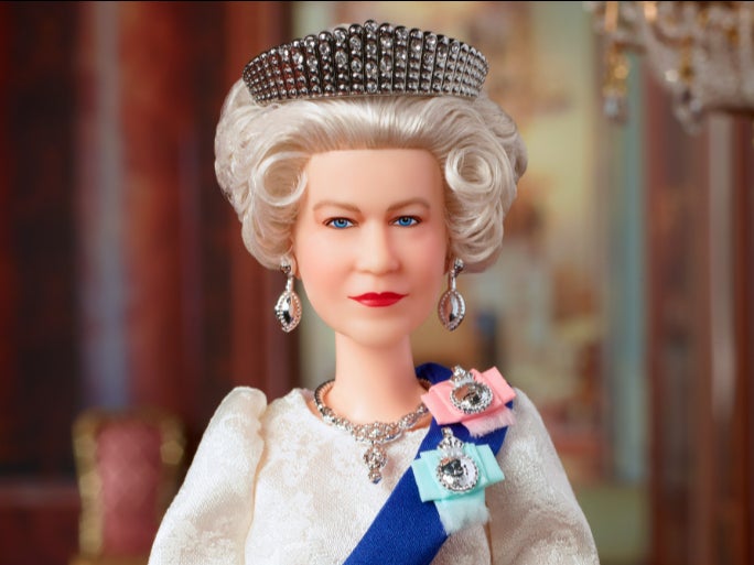 The Queen’s Barbie doll will be complete with her iconic tiara and adorned blue riband