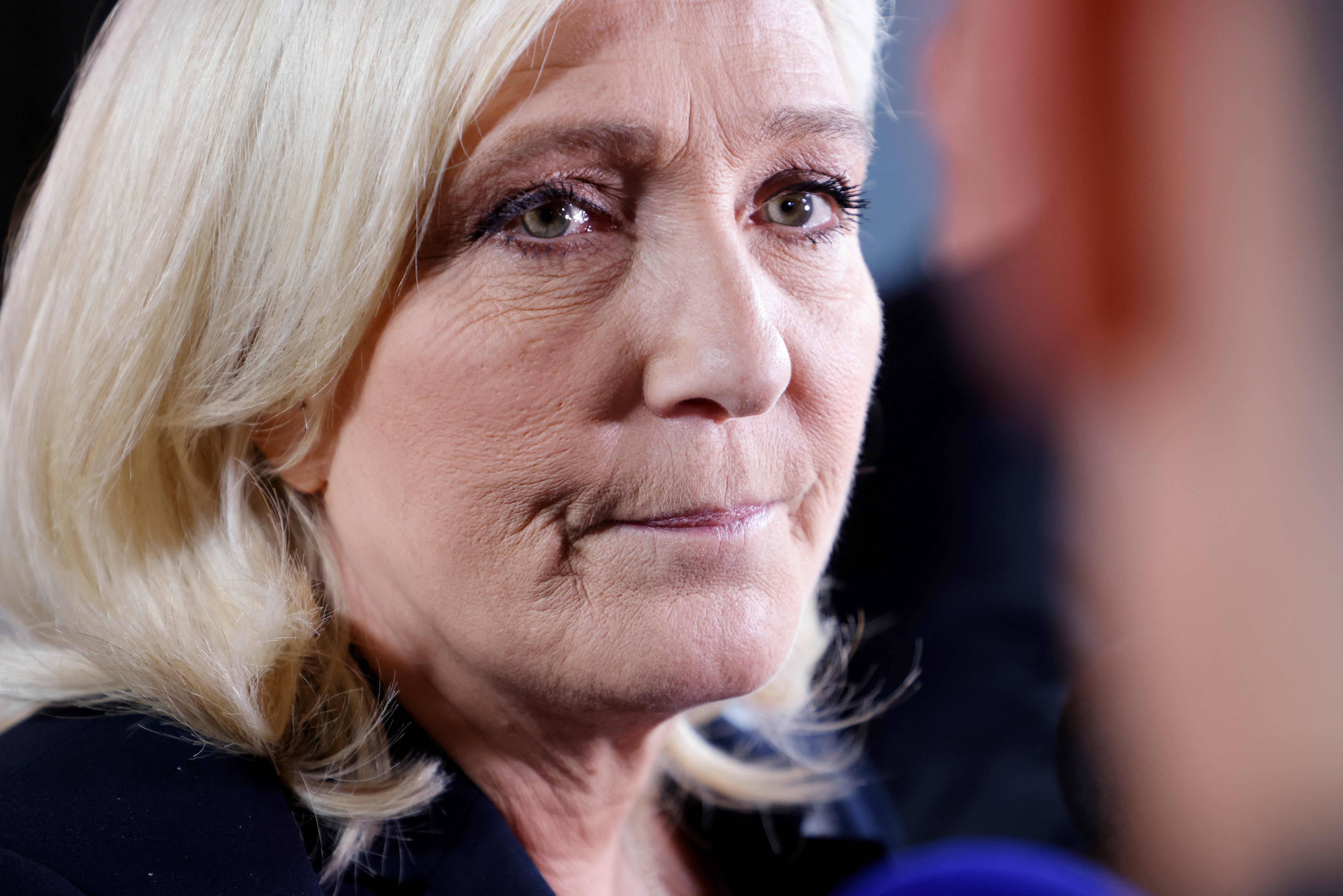 Rassemblement National (RN) candidate Marine Le Pen speaks to the media after the live televised debate