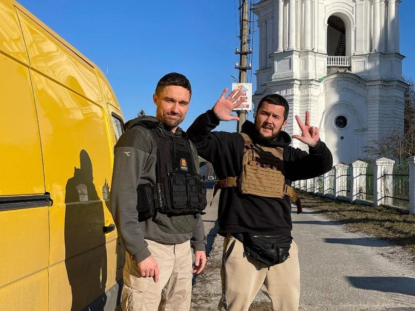 Alex Dolgopolov (left) delivers aid with a friend to Chernihiv