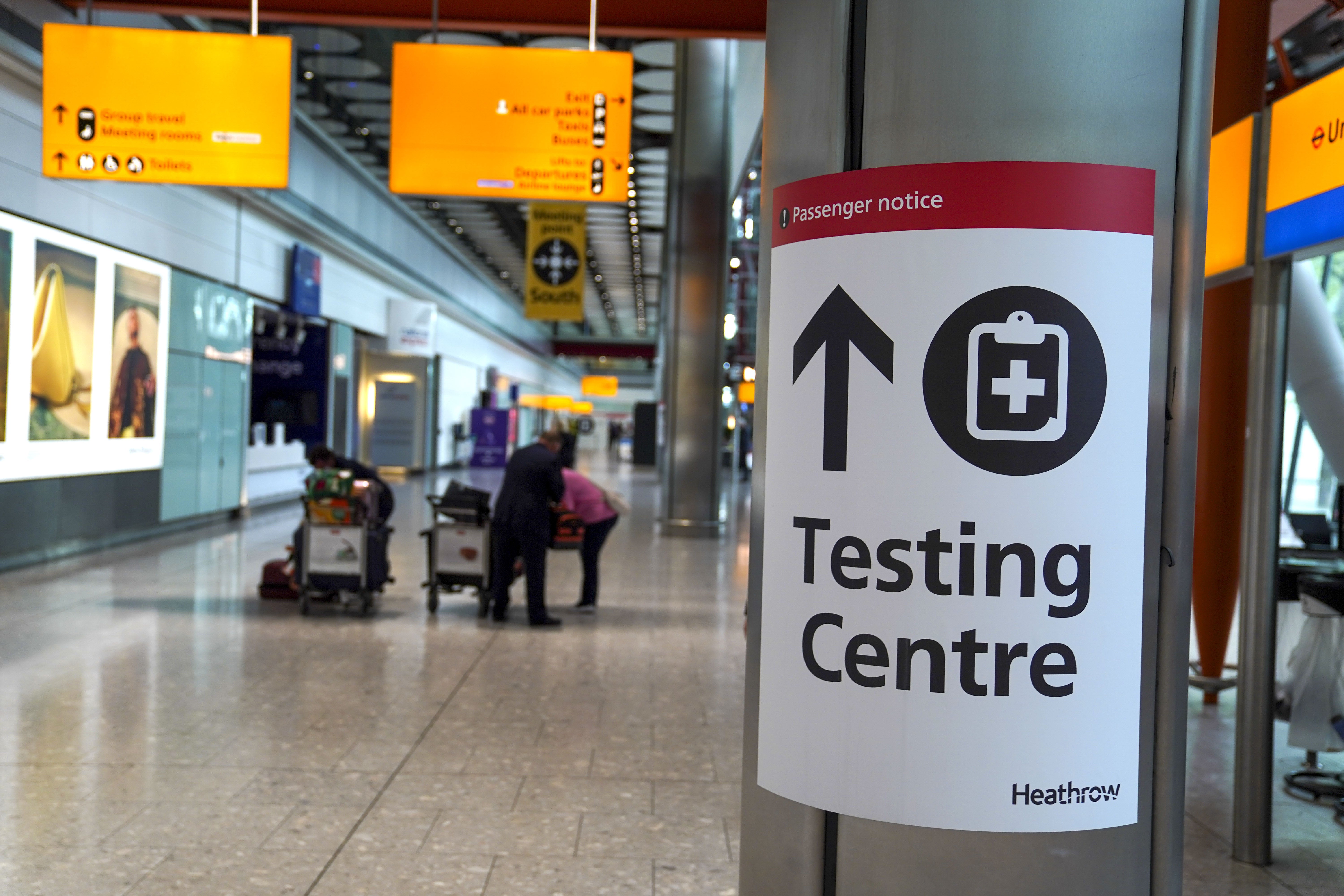 England’s coronavirus restrictions on international travel were imposed by different Government departments with no overall assessment of their impact, according to a report (Steve Parsons/PA)