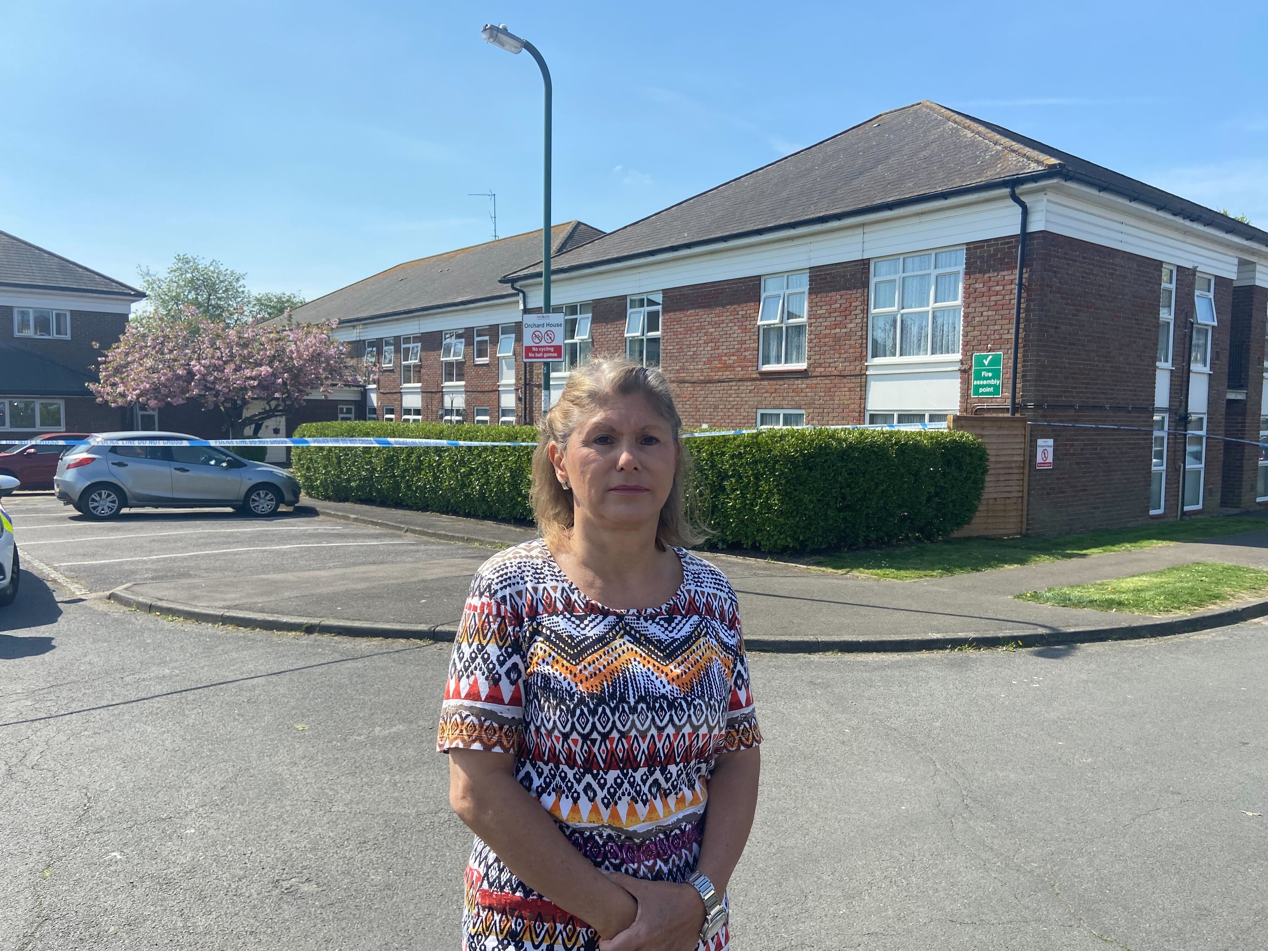 Resident Eve Speitht, 60, speaks outside Orchard House, where three people were found dead in a ‘targeted attack'