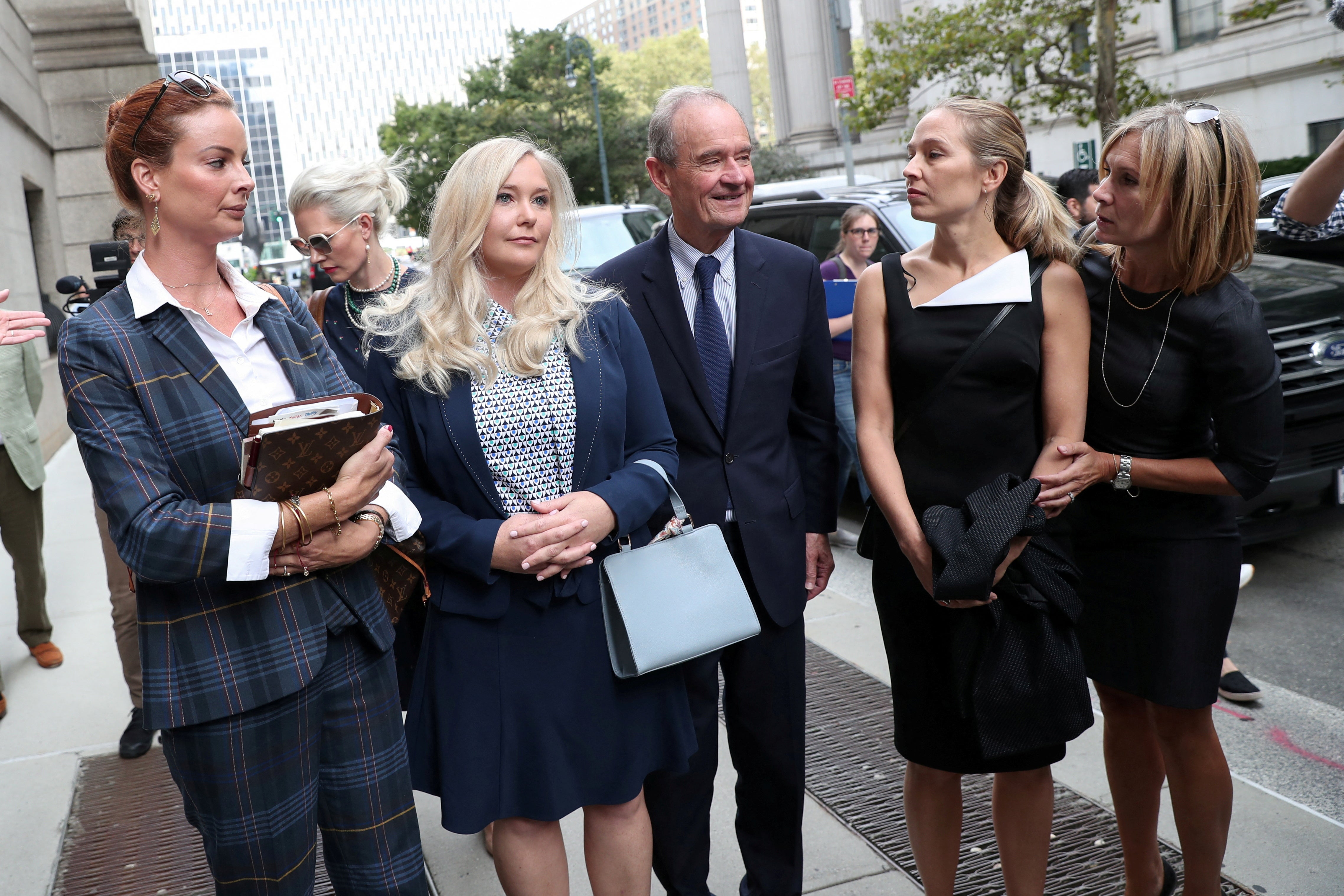 Virginia Giuffre (second from left)