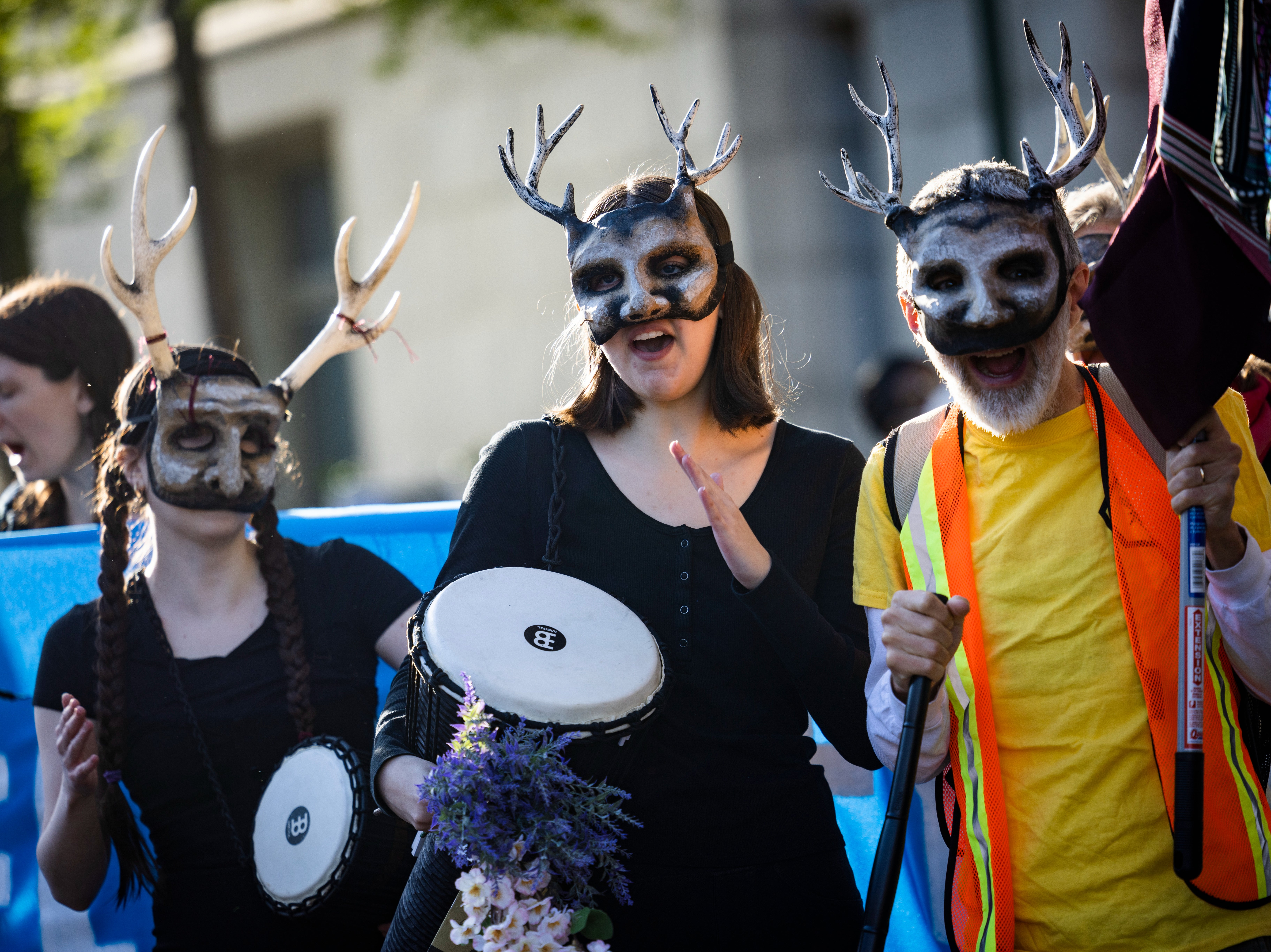 Extinction Rebellion activists march to the Wilson Building, the seat of DC’s local governance, for an Earth Day protest to ‘stop all new fossil fuel infrastructure in the nation’s capital'