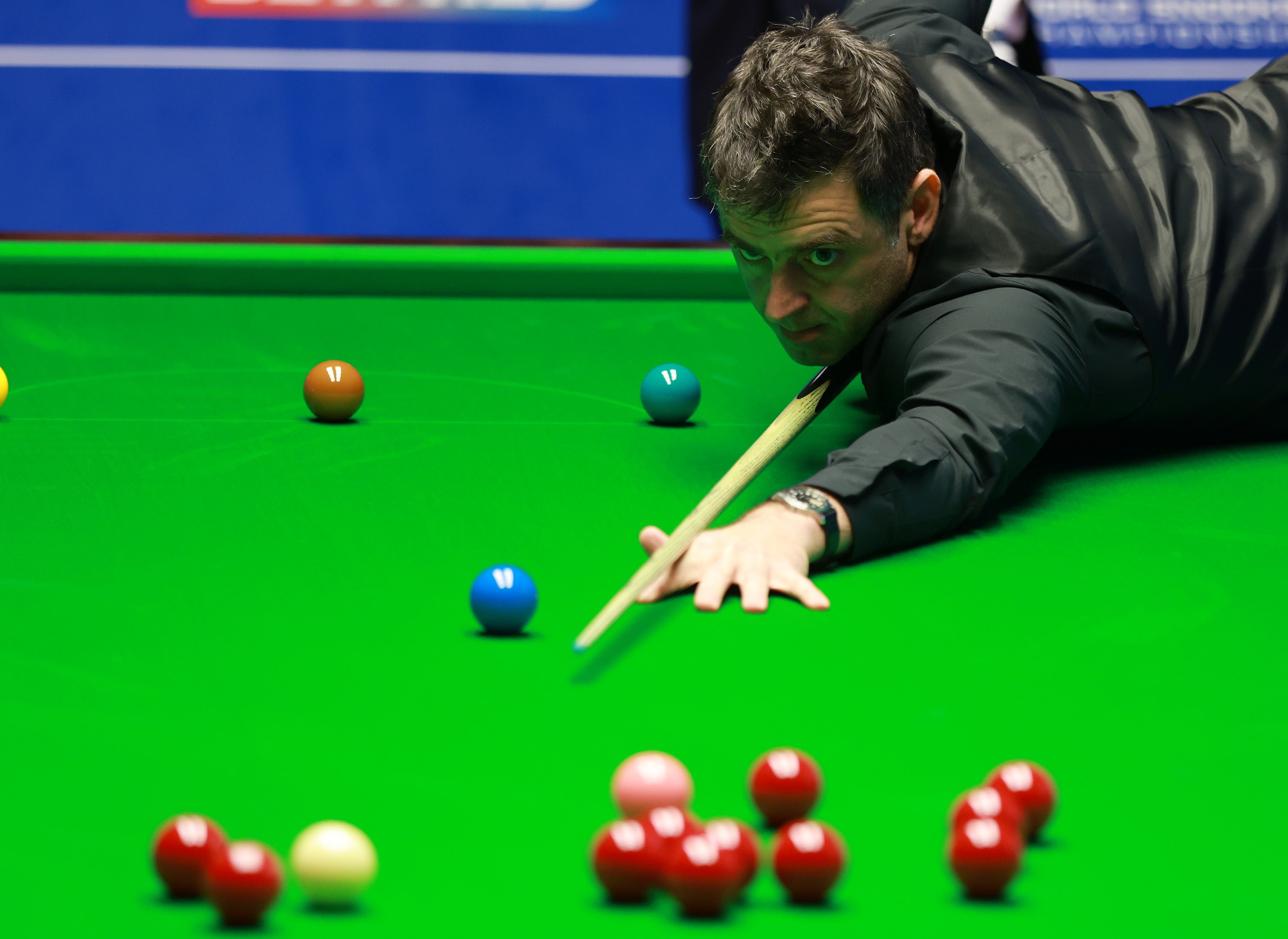 Ronnie O’Sullivan returned to win one frame against Mark Allen (Ian Hodgson/PA)